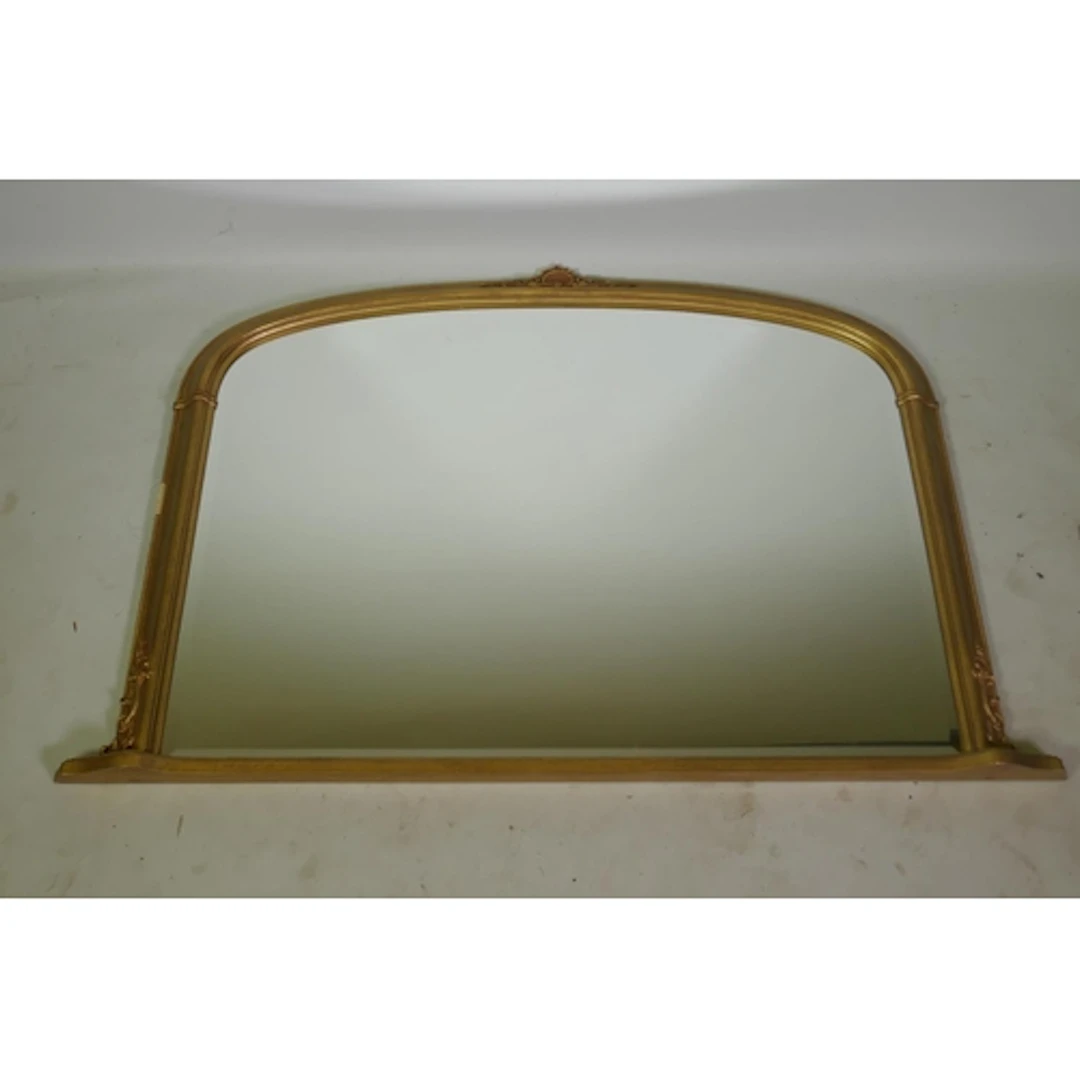 A gilt bevelled glass overmantel mirror, 118 x 80cm