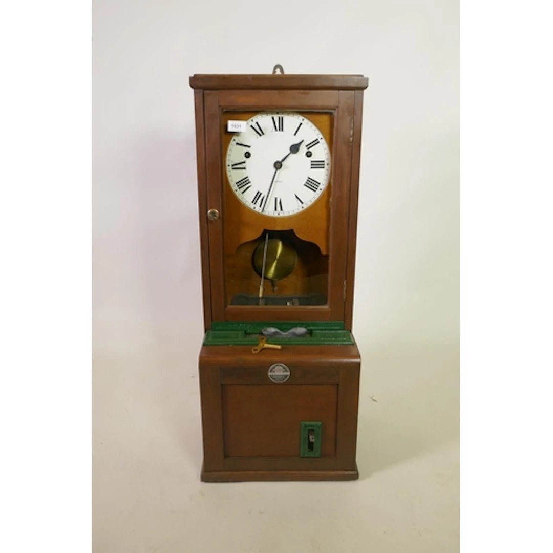 An early C20th Blick time recorder/clocking-in machine, 38 x...