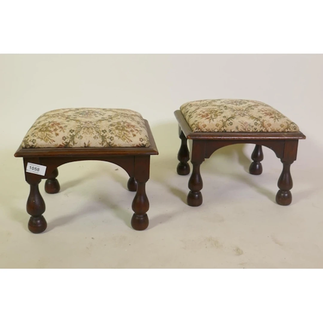 Pair of antique walnut foot stools raised on turned supports...