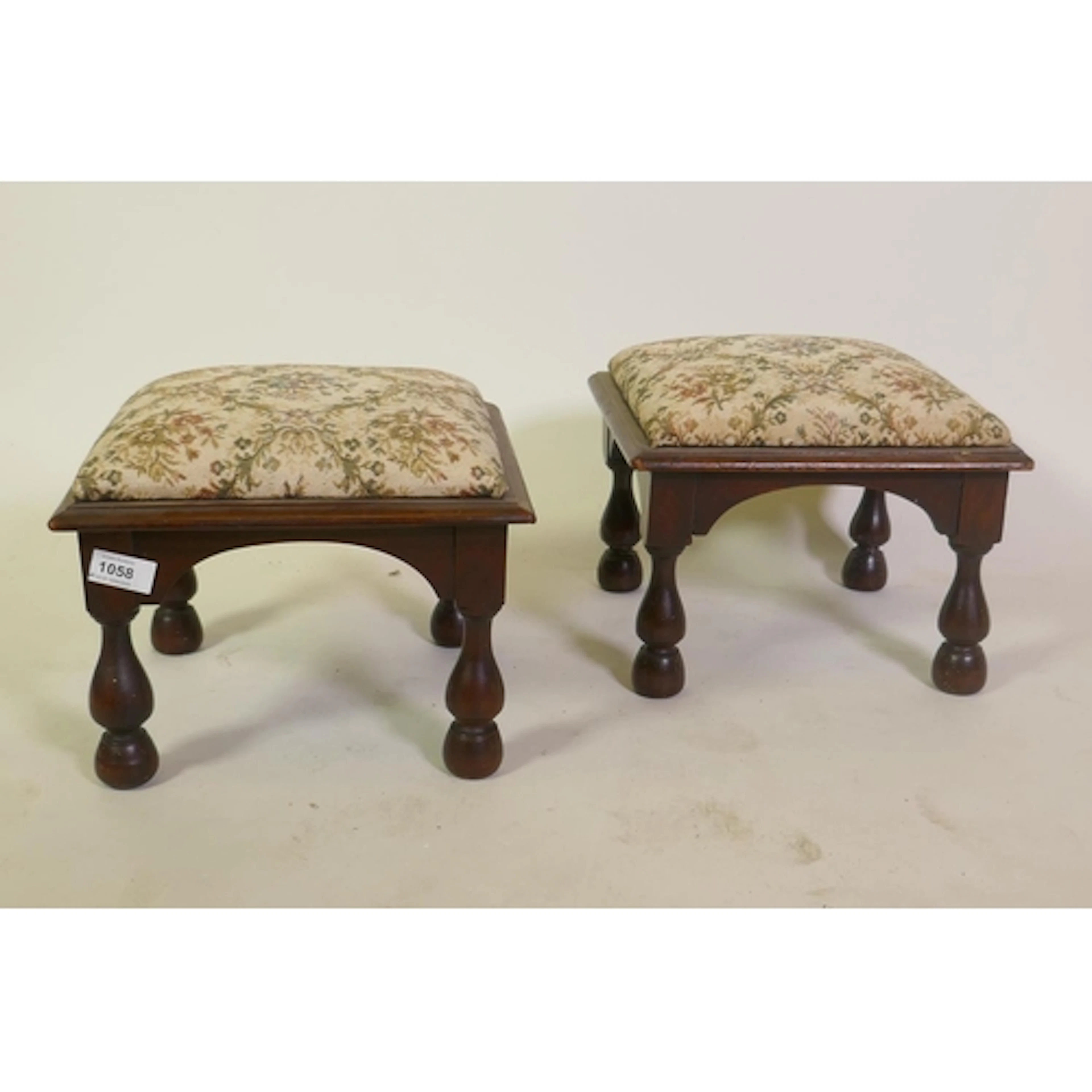Pair of antique walnut foot stools raised on turned supports...