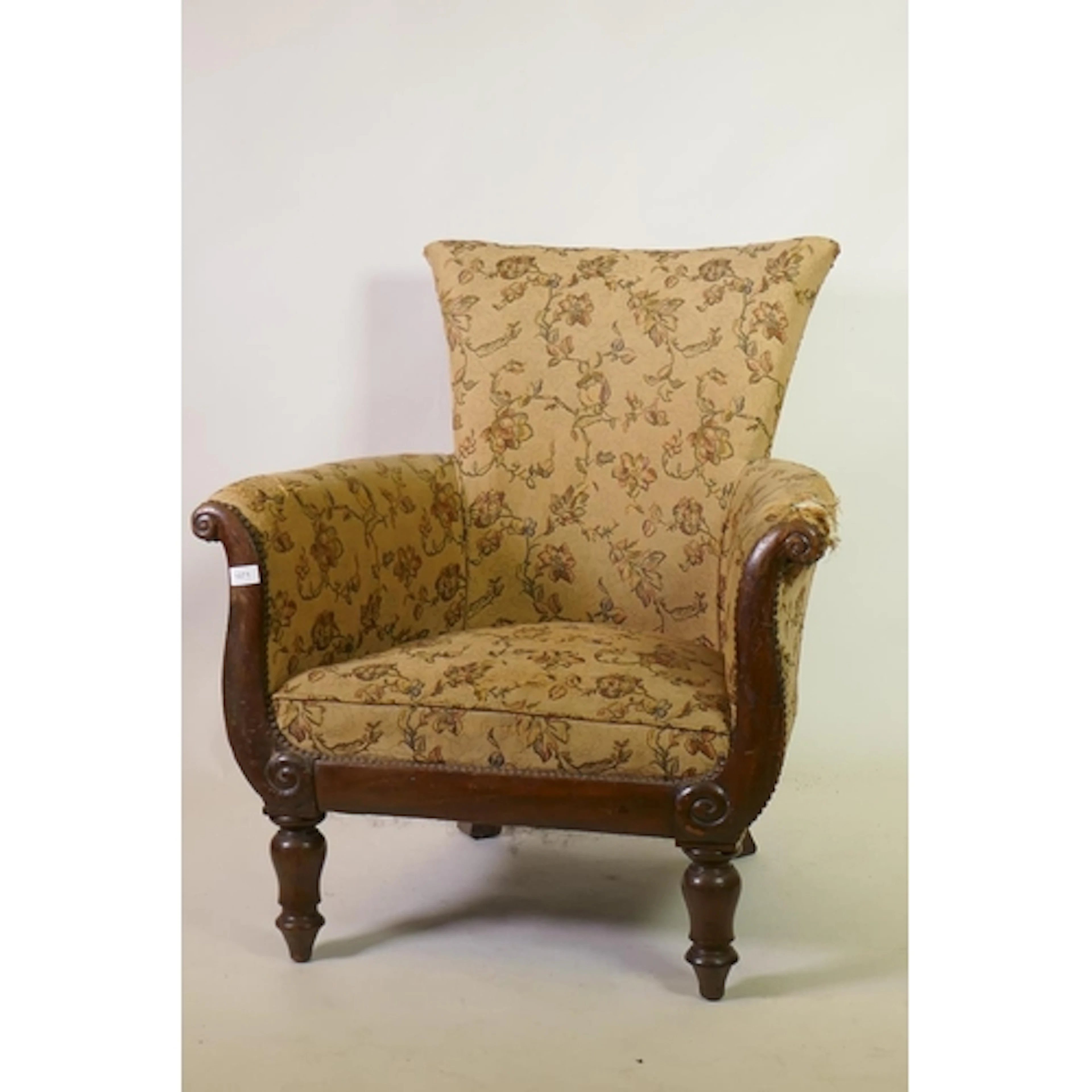 Early C19th walnut armchair with scroll arms and carved deco...