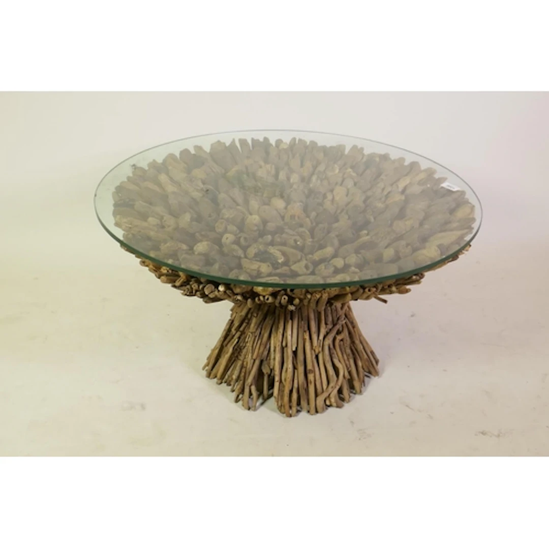 A driftwood occasional table with glass top, 75cm diameter, ...