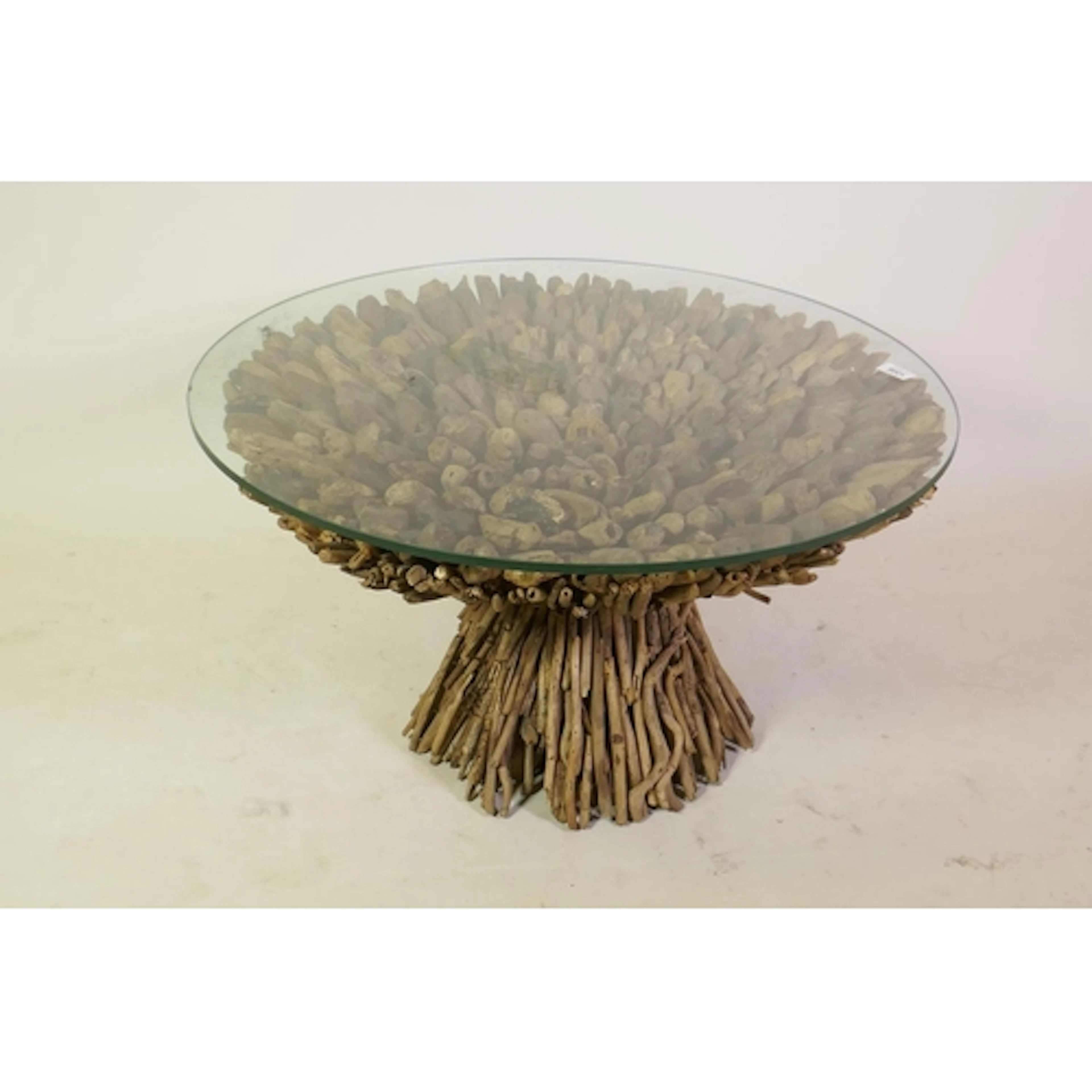 A driftwood occasional table with glass top, 75cm diameter, ...