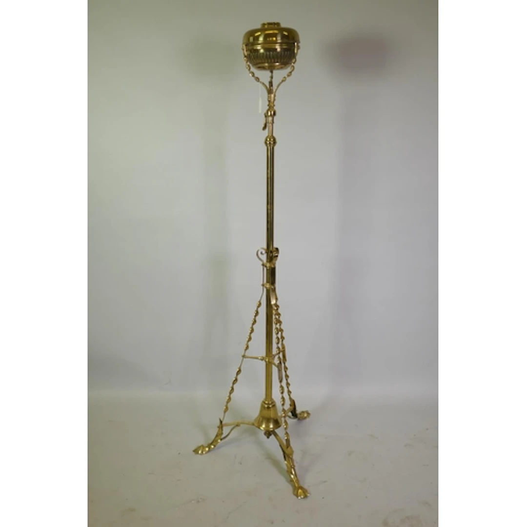 An Edwardian telescopic brass floor oil lamp, 147cm high at ...