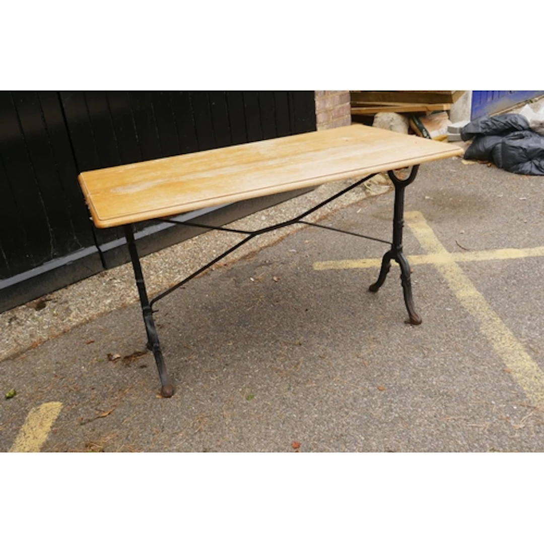 Victorian style painted cast iron pub table with pine top, 1...