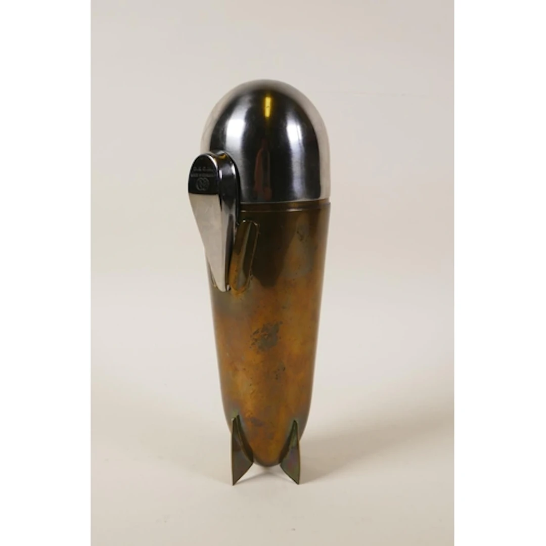 An Art Deco style brass and plated metal Zeppelin cocktail s...