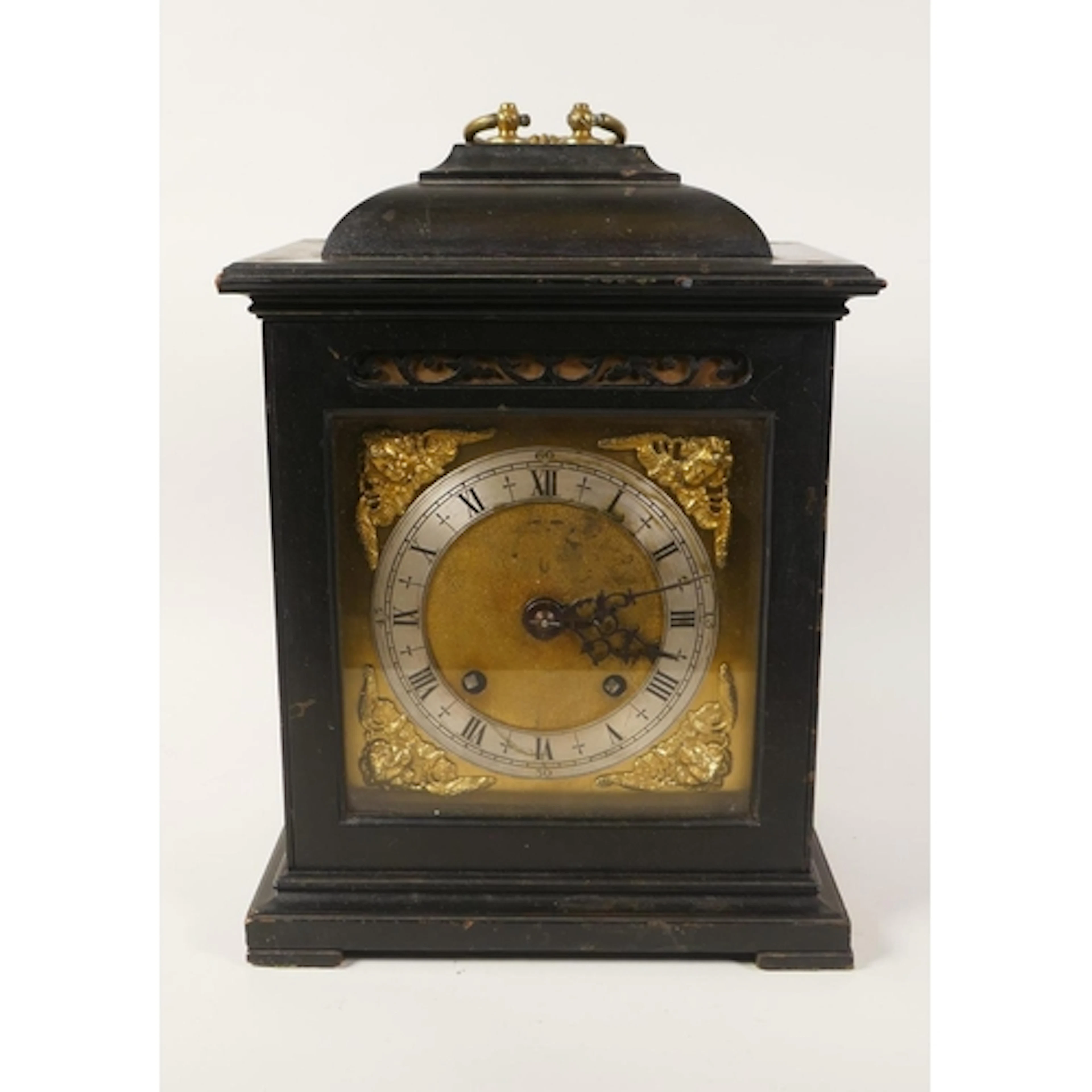 An antique ebonised wood cased bracket clock, with brass dia...