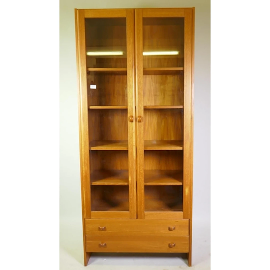 A mid century Danish teak veneered display cabinet by Domino...