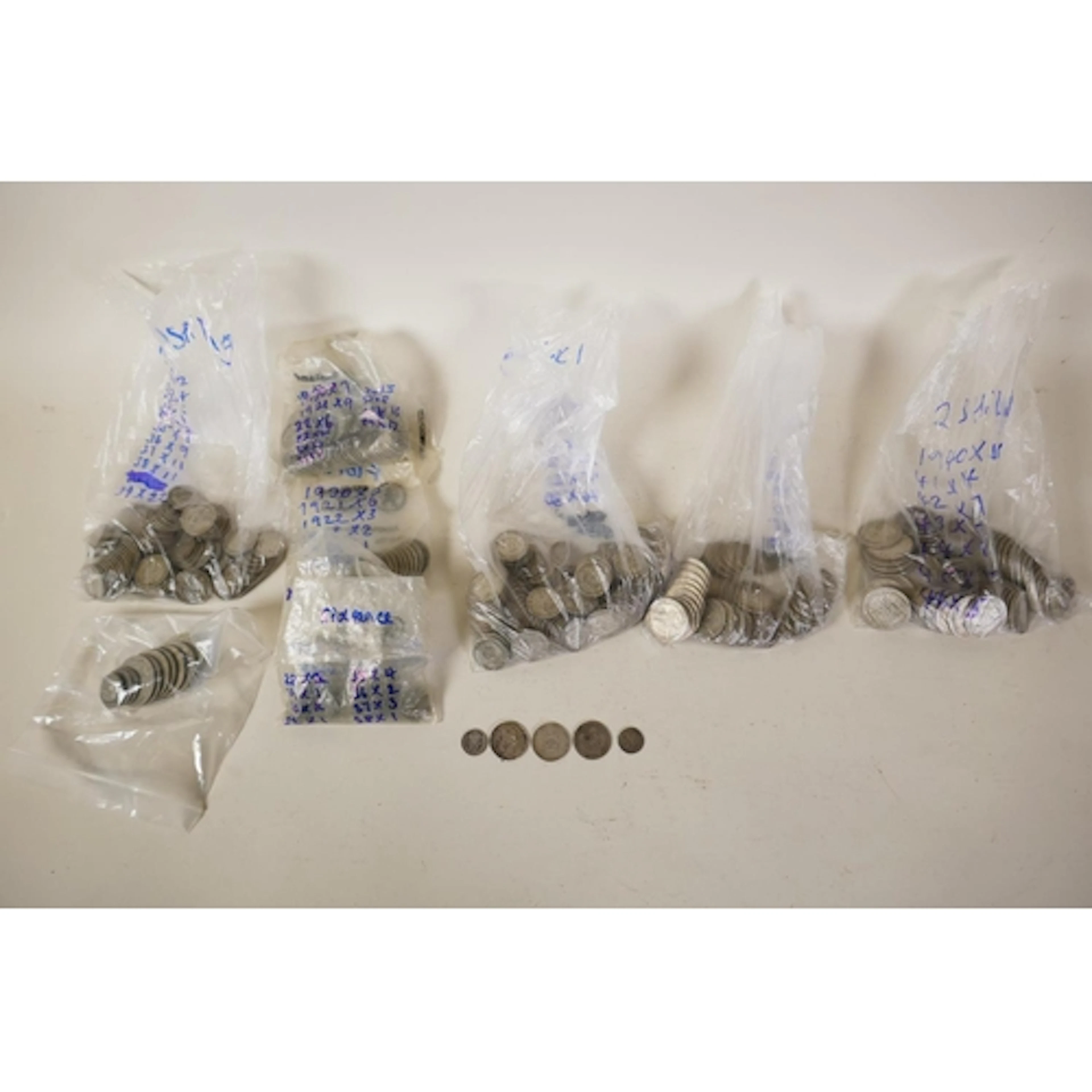 A collection of various British 1920s-1946 half silver coina...