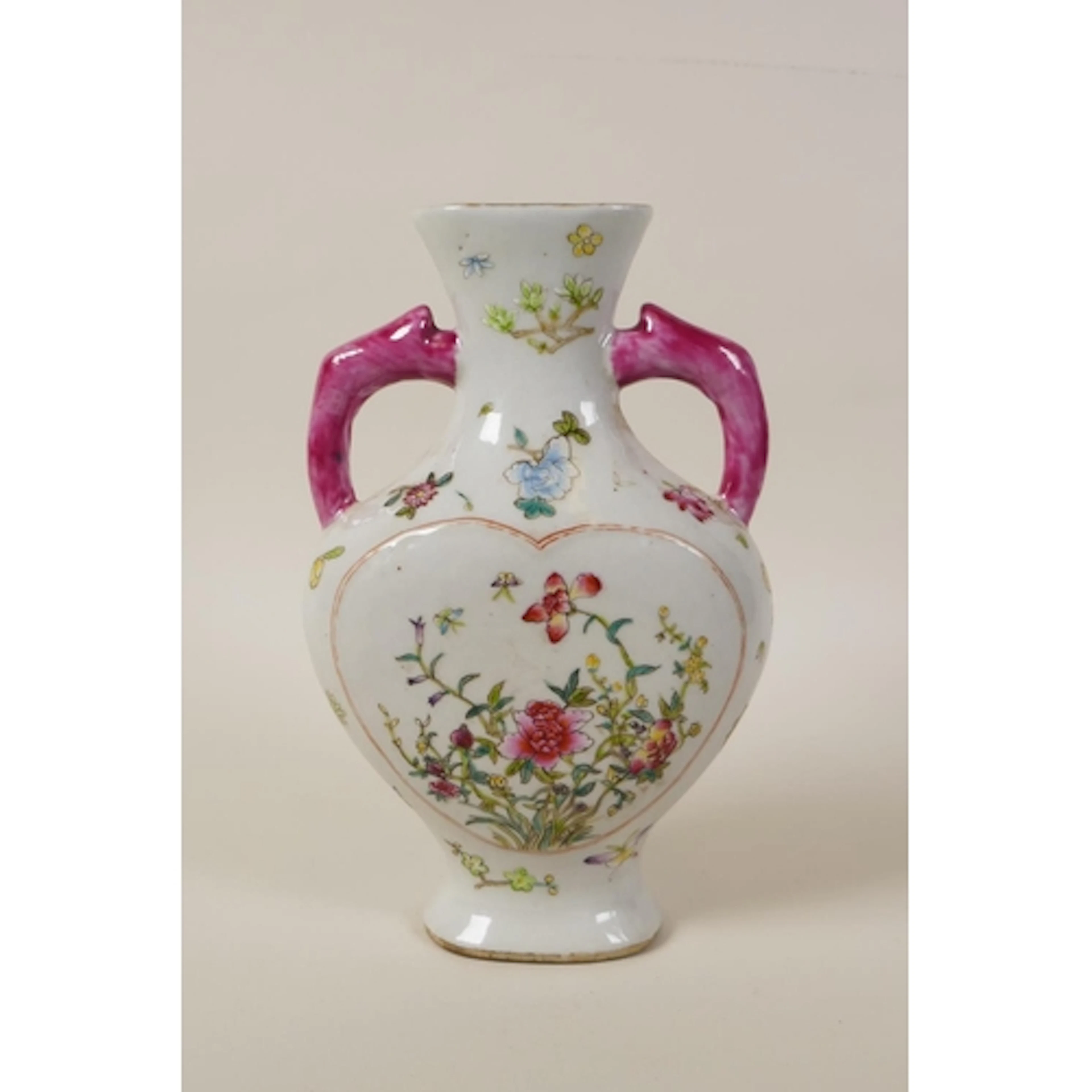 A Chinese famille rose porcelain heart shaped two handle vas...