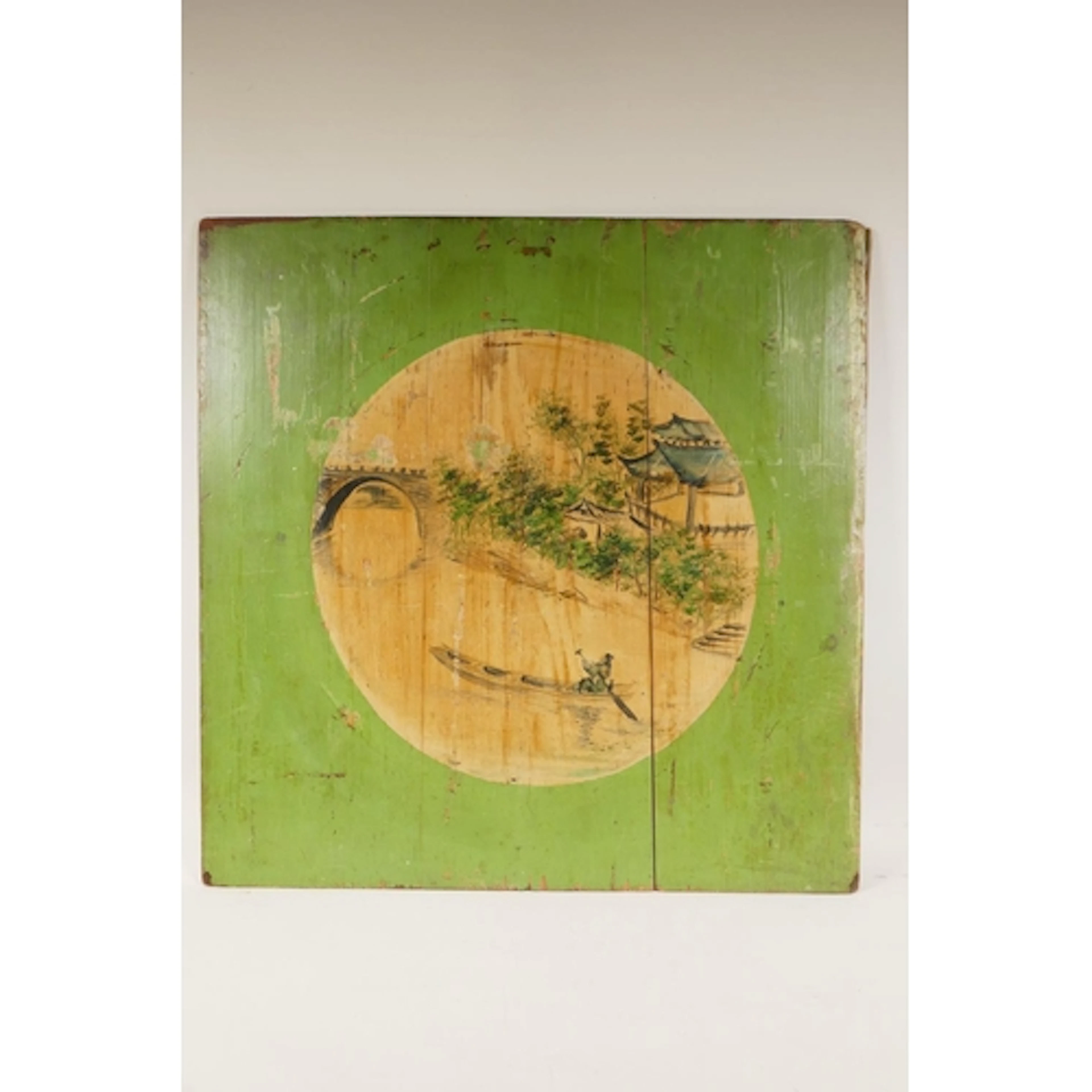 An antique Chinese painted panel depicting a boatman on a ri...