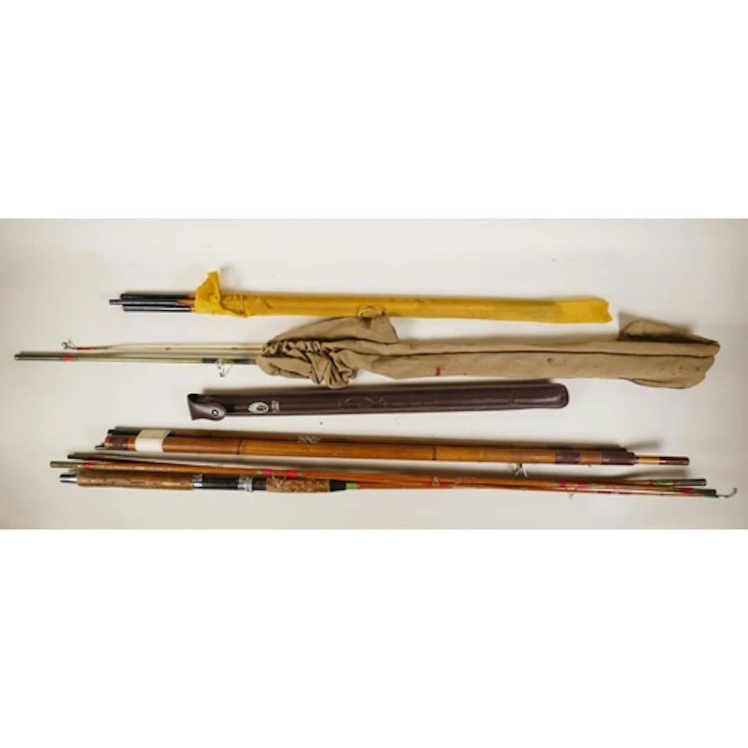 A collection of five vintage fly fishing rods