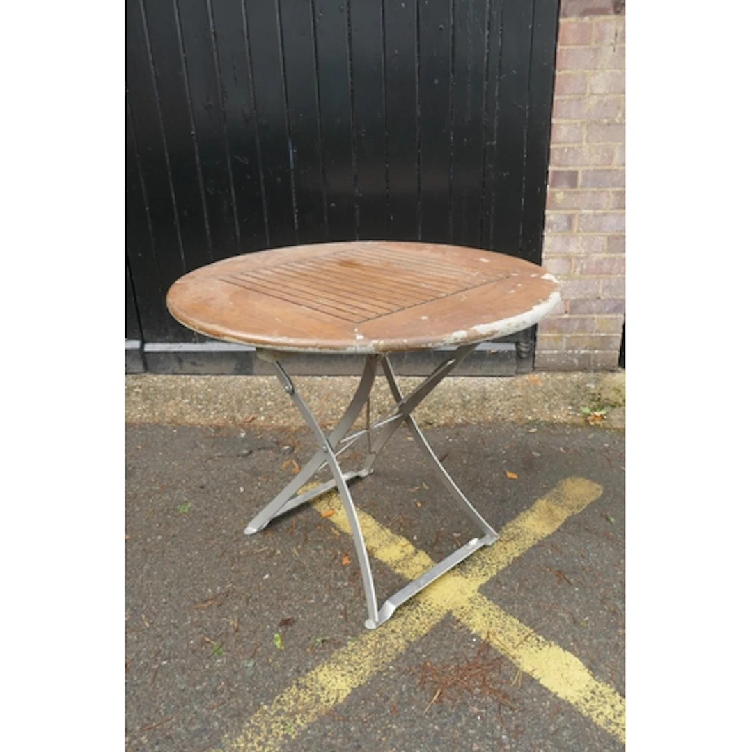 A single 'Lister' garden table with slatted teak top and met...