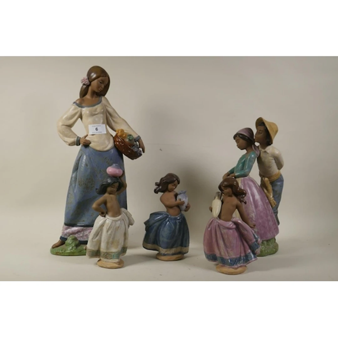 Lladro figure, Seasonal Gifts, No.12229, 43cm high; and thre...