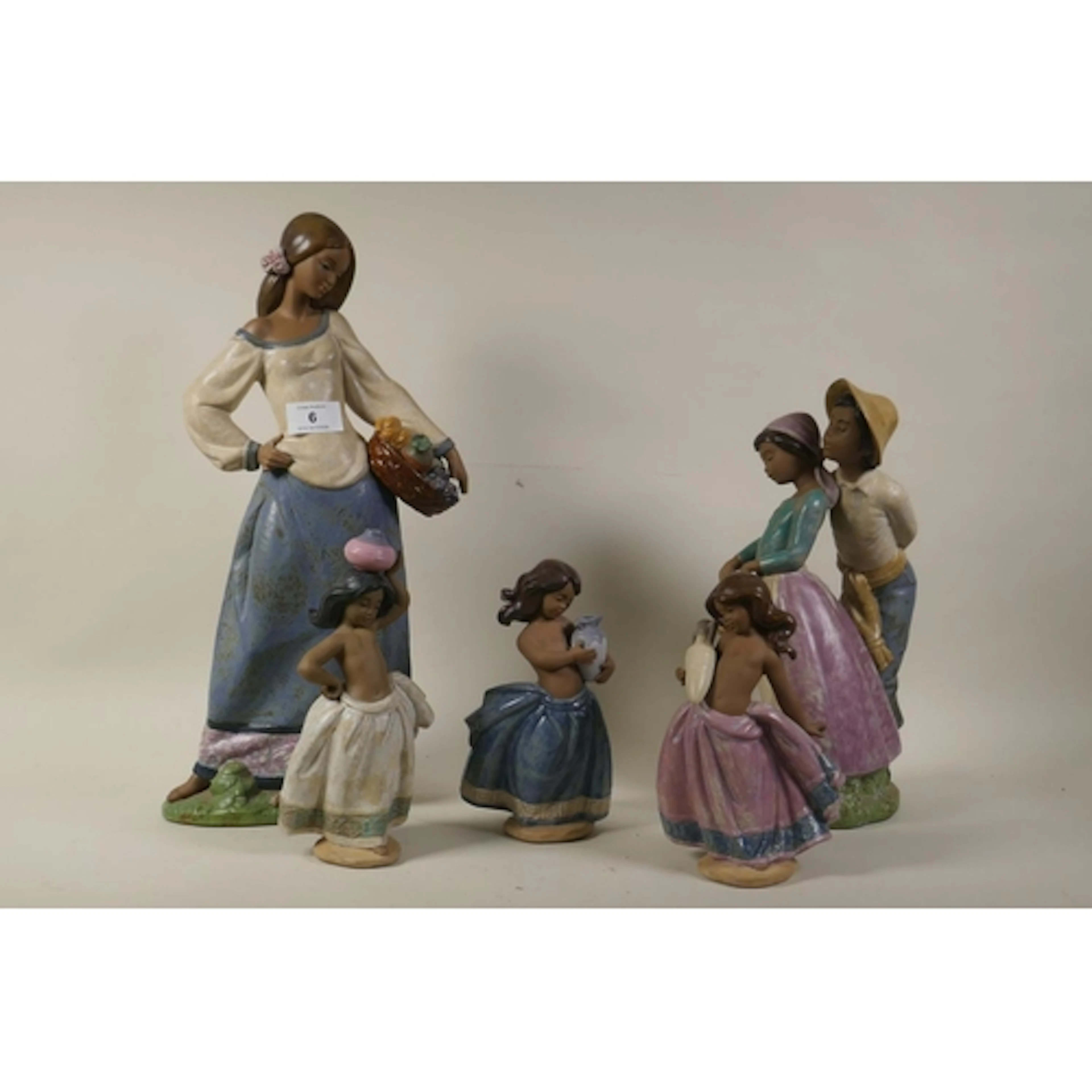 Lladro figure, Seasonal Gifts, No.12229, 43cm high; and thre...