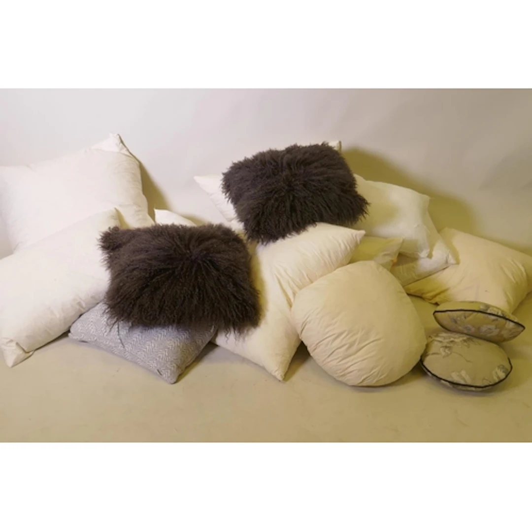 Quantity of new feather filled scatter cushions for covering...