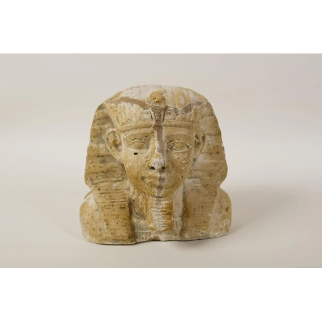 A cast stone head bust of an Egyptian pharaoh, 16cm high