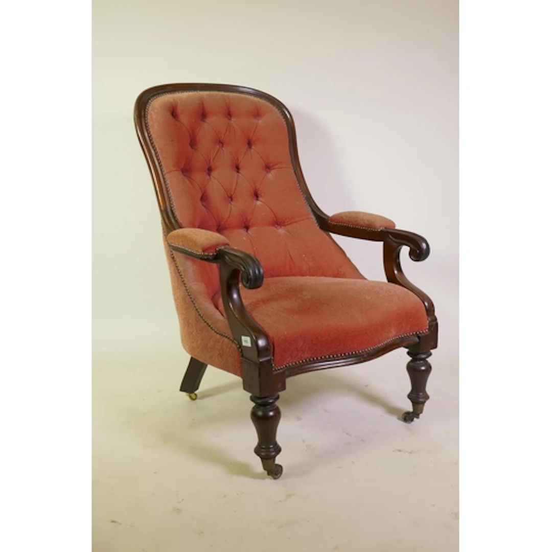 Victorian mahogany showframe open armchair, with shaped butt...