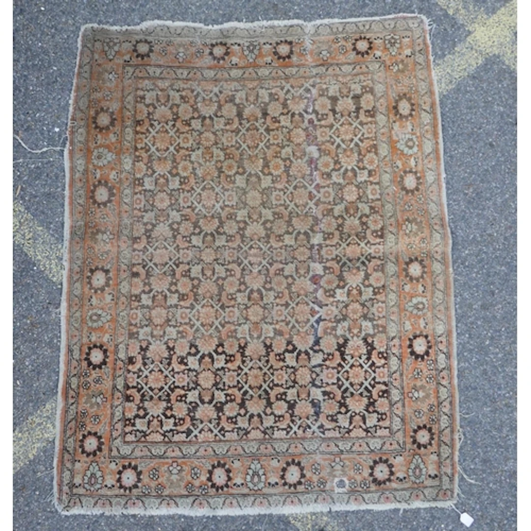 An antique Persian faded orange and brown Tabriz rug, 125 x ...