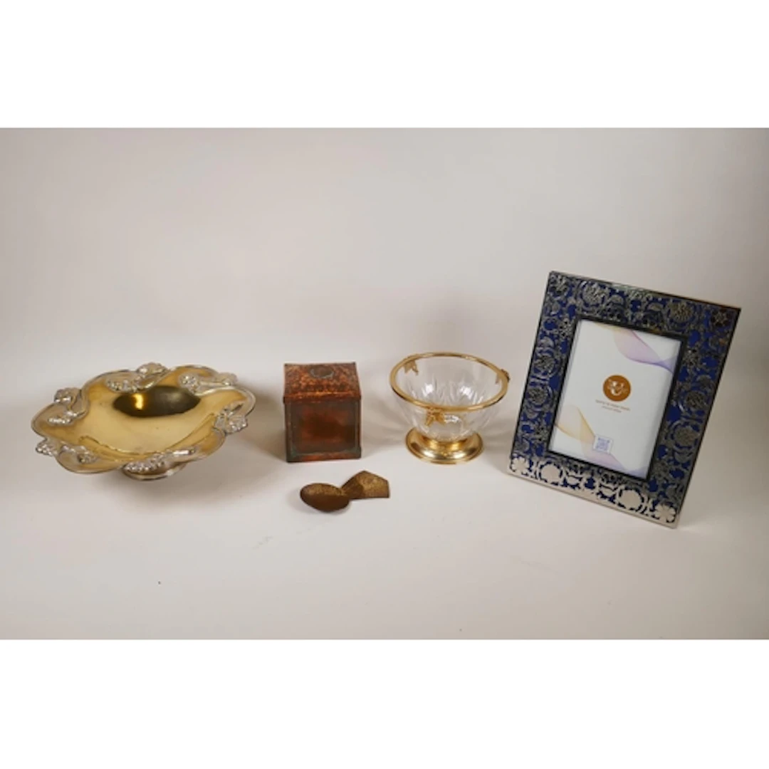 An Art Nouveau silver plated bowl, a hammered copper and bra...