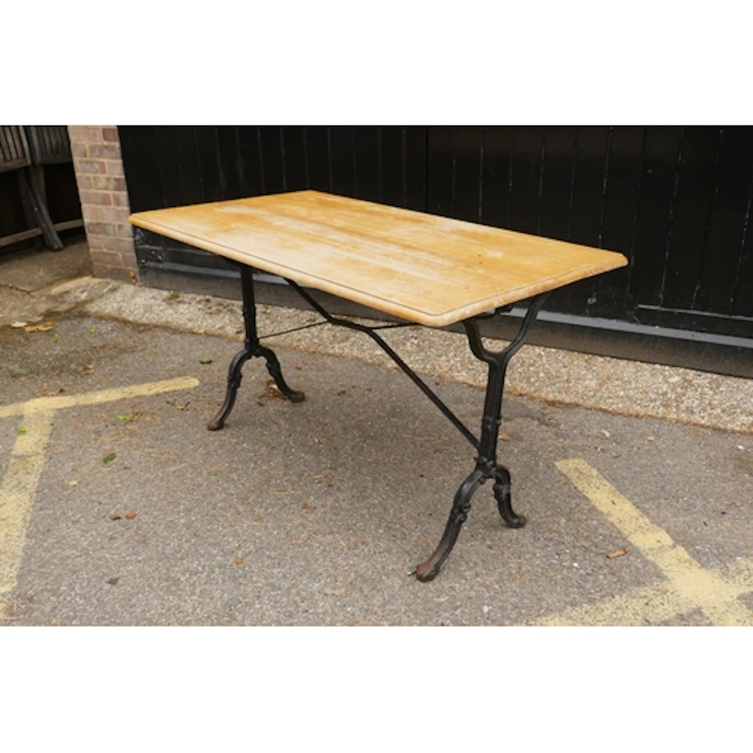 Victorian style painted cast iron pub table with pine top, 1...