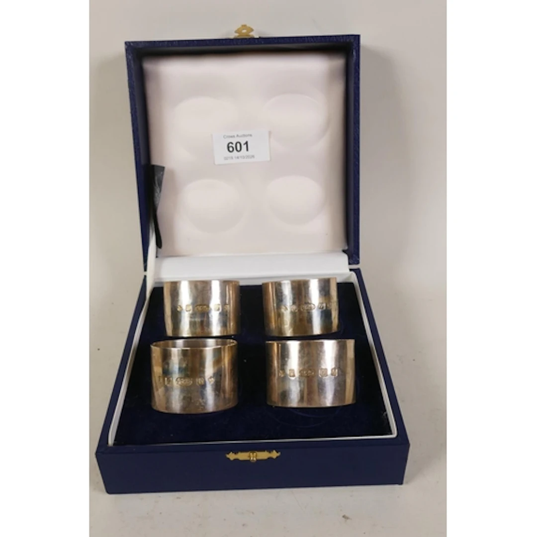 Set of four Irish cased hallmarked silver napkin rings, Dubl...