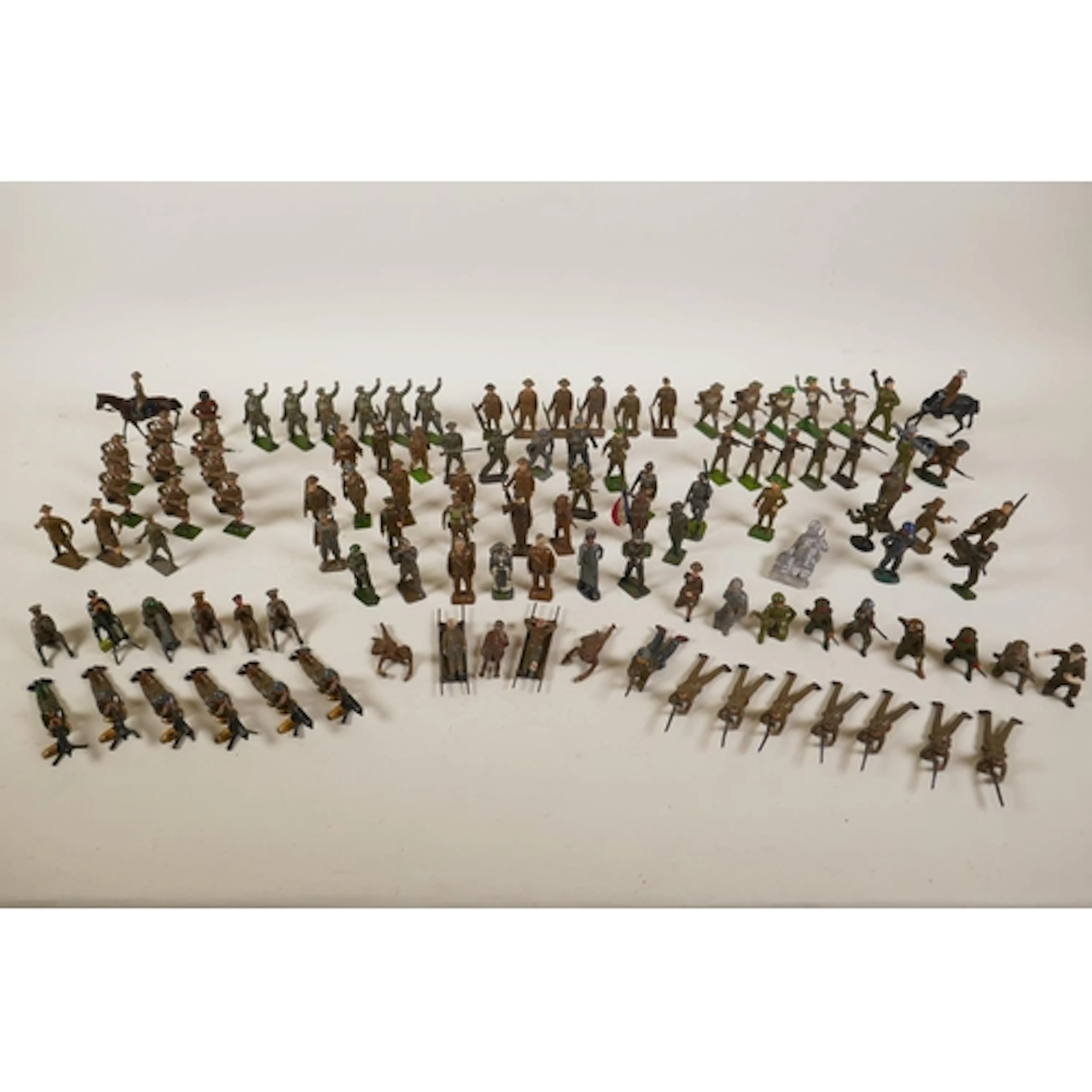 A collection of Britains WWI and WWII painted lead soldiers,...