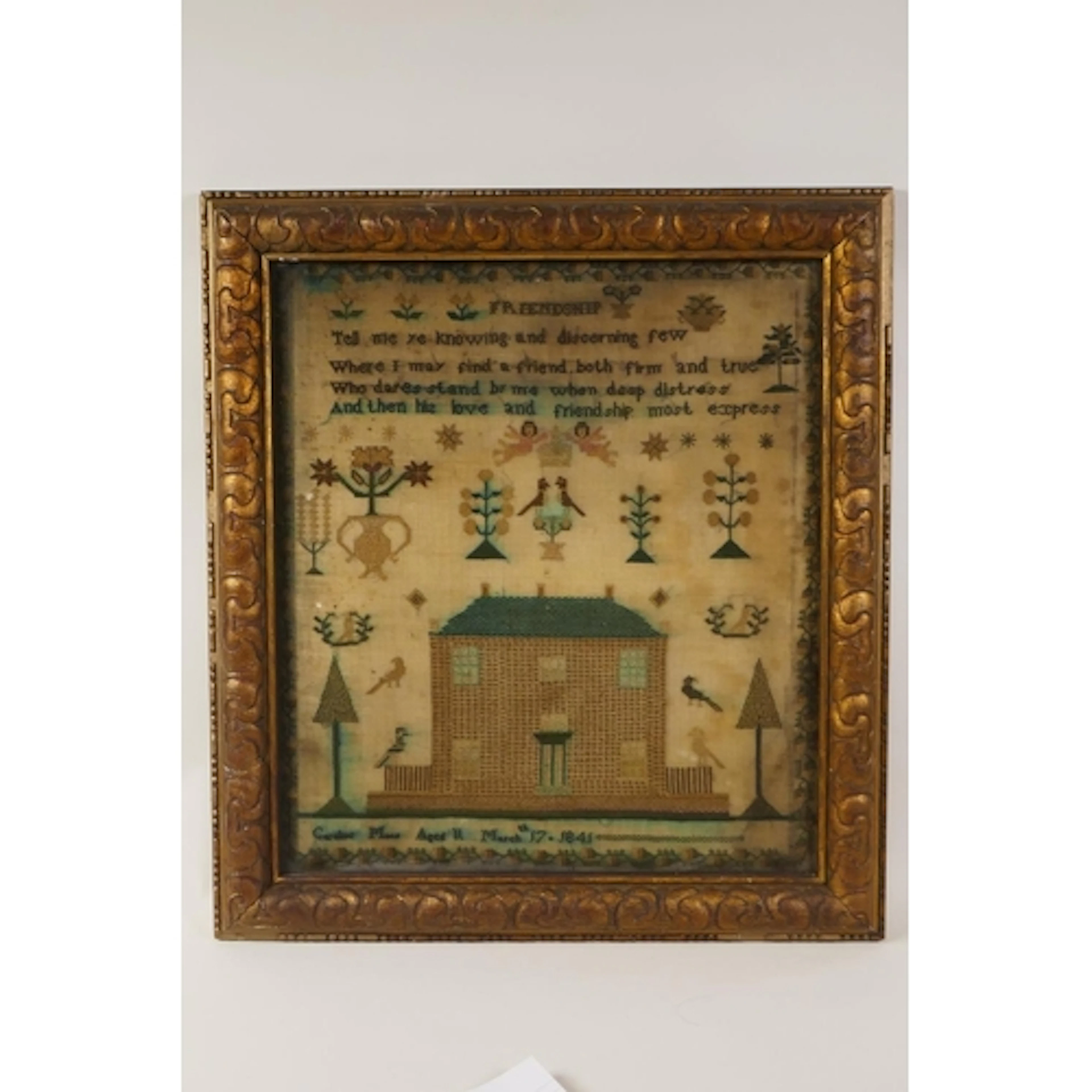 A C19th framed sampler worked by Carolina Moss, aged 11, 184...