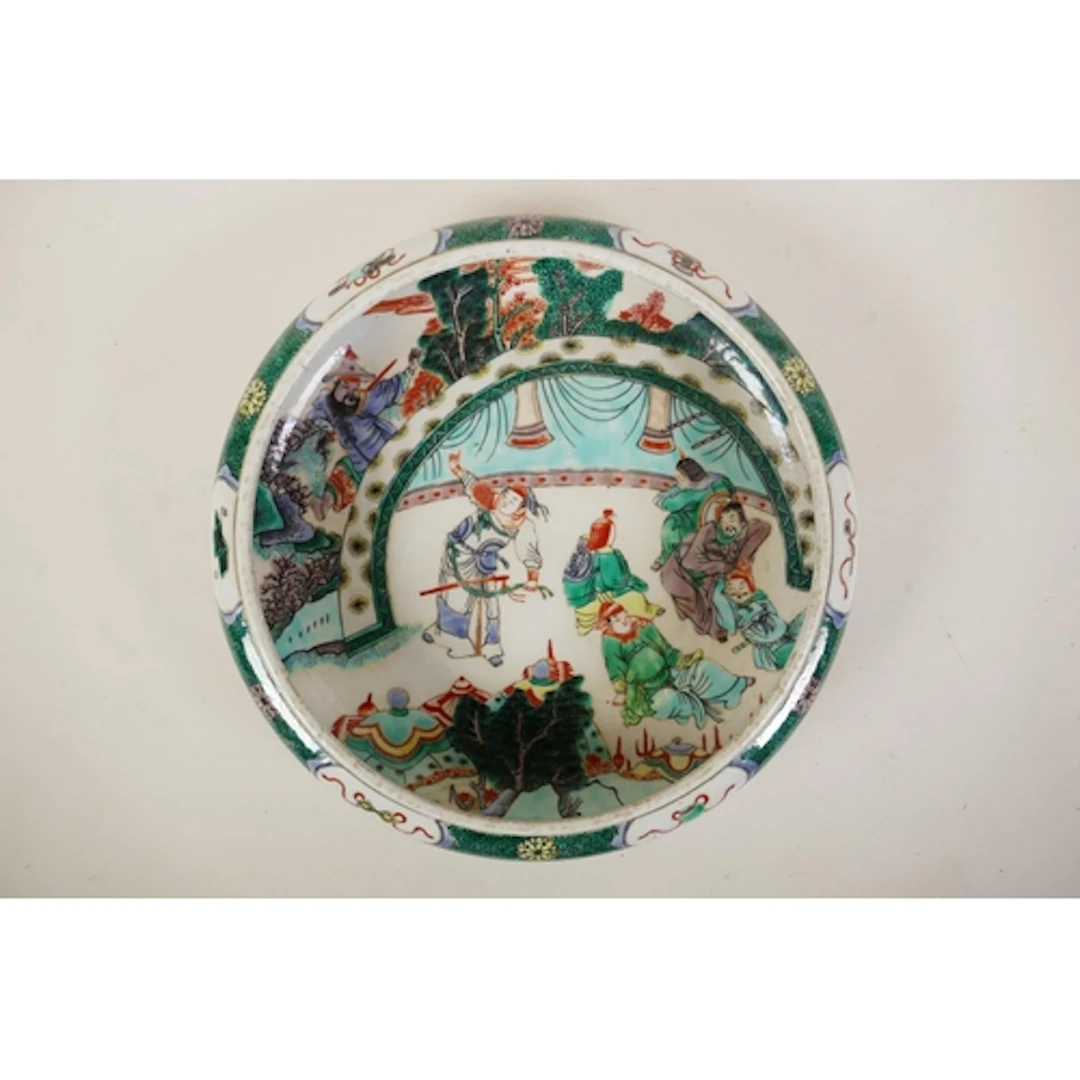 A Chinese famille verte porcelain KangXi style dish with rol...