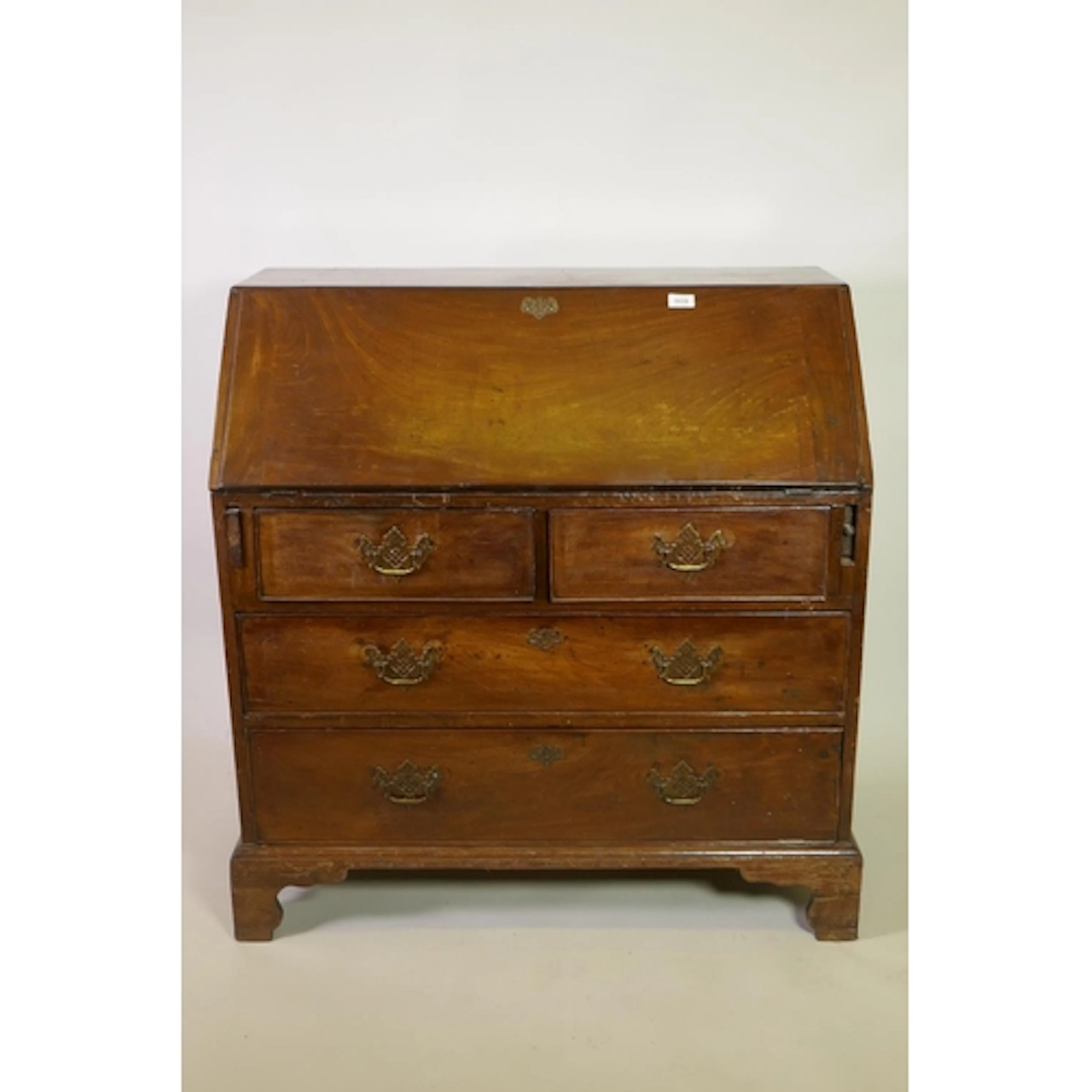 A Georgian mahogany bureau, the fall front with fitted inter...