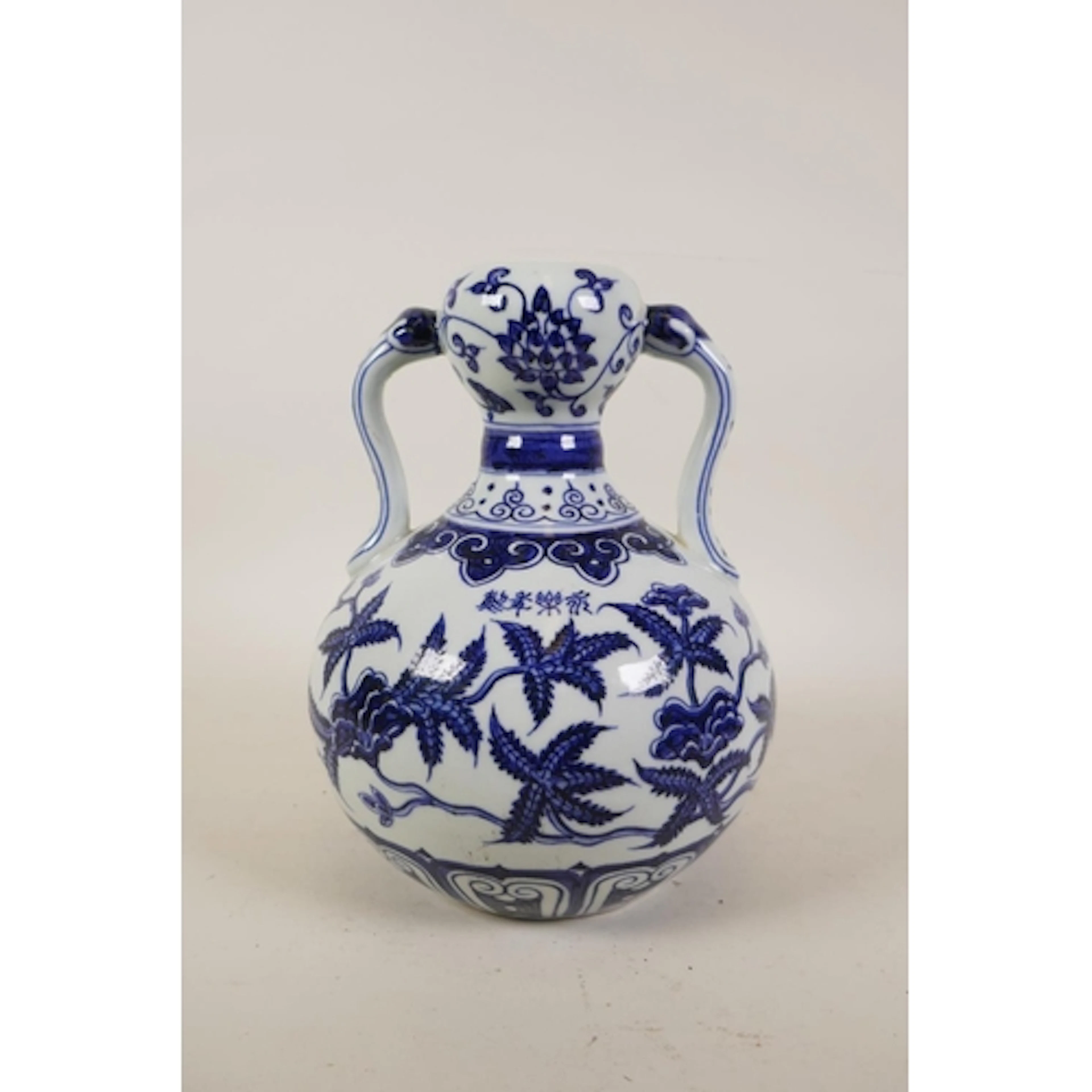 A Chinese blue and white porcelain two handled double gourd ...