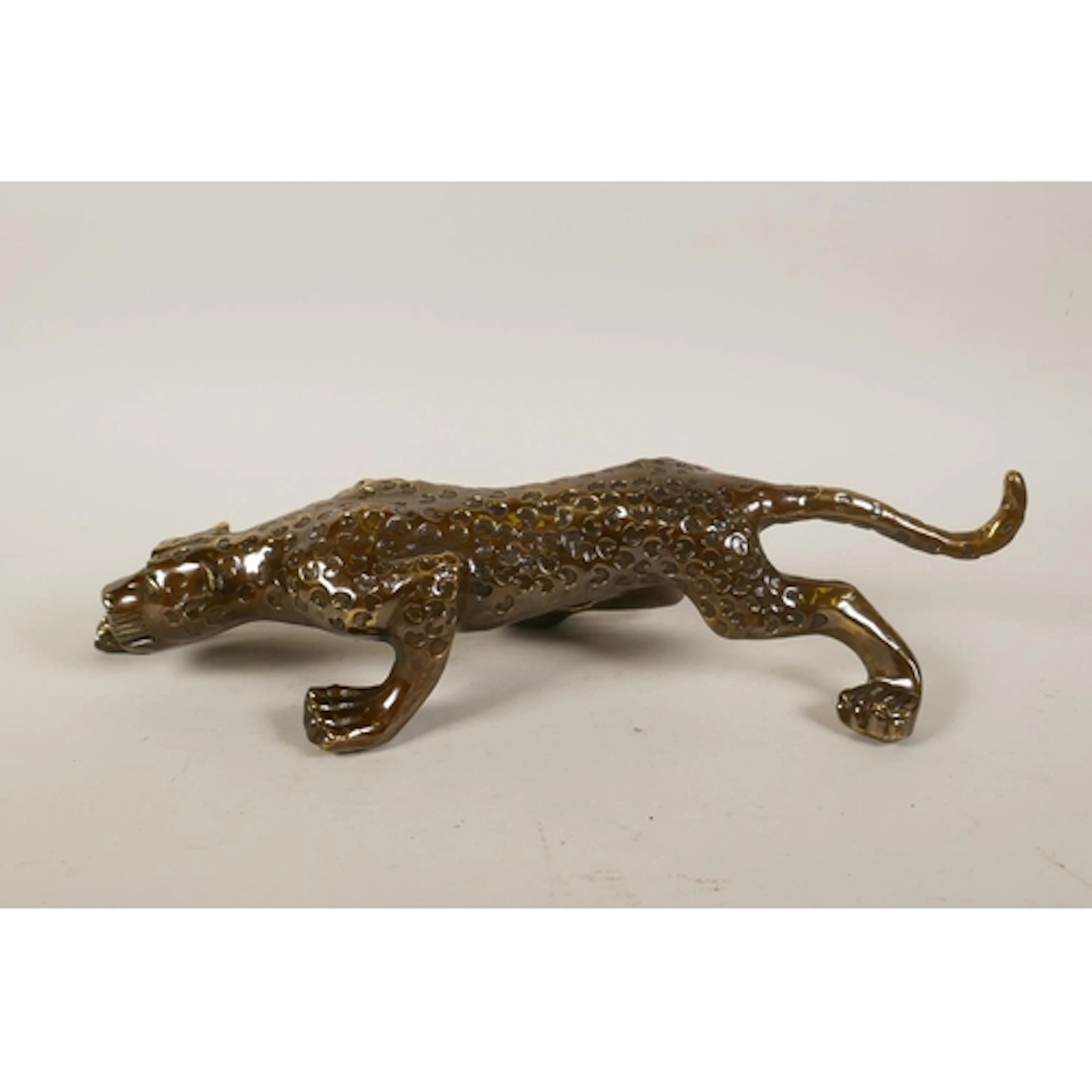 A filled bronze leopard, 37cm long