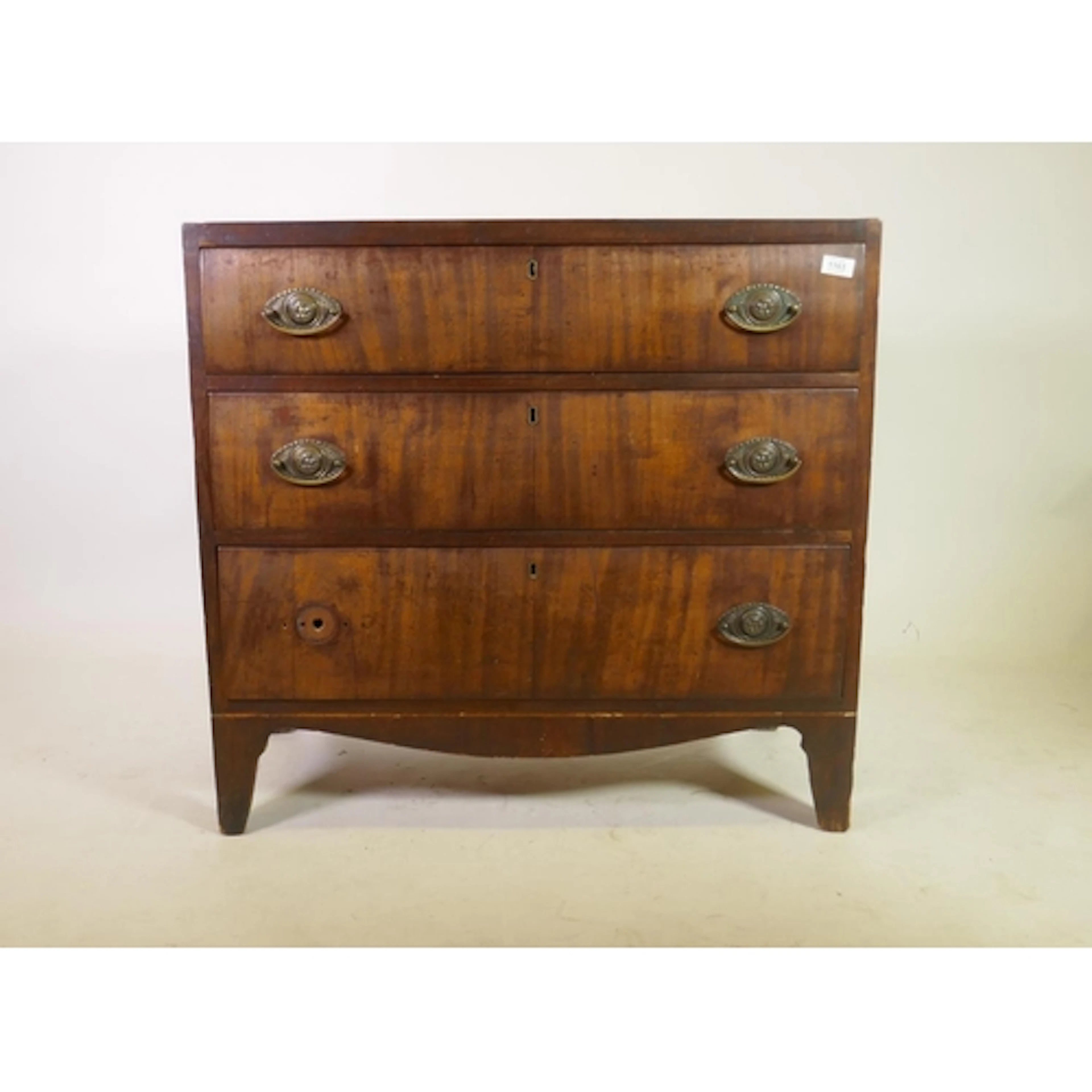 George III mahogany chest of three long drawers, with brass ...