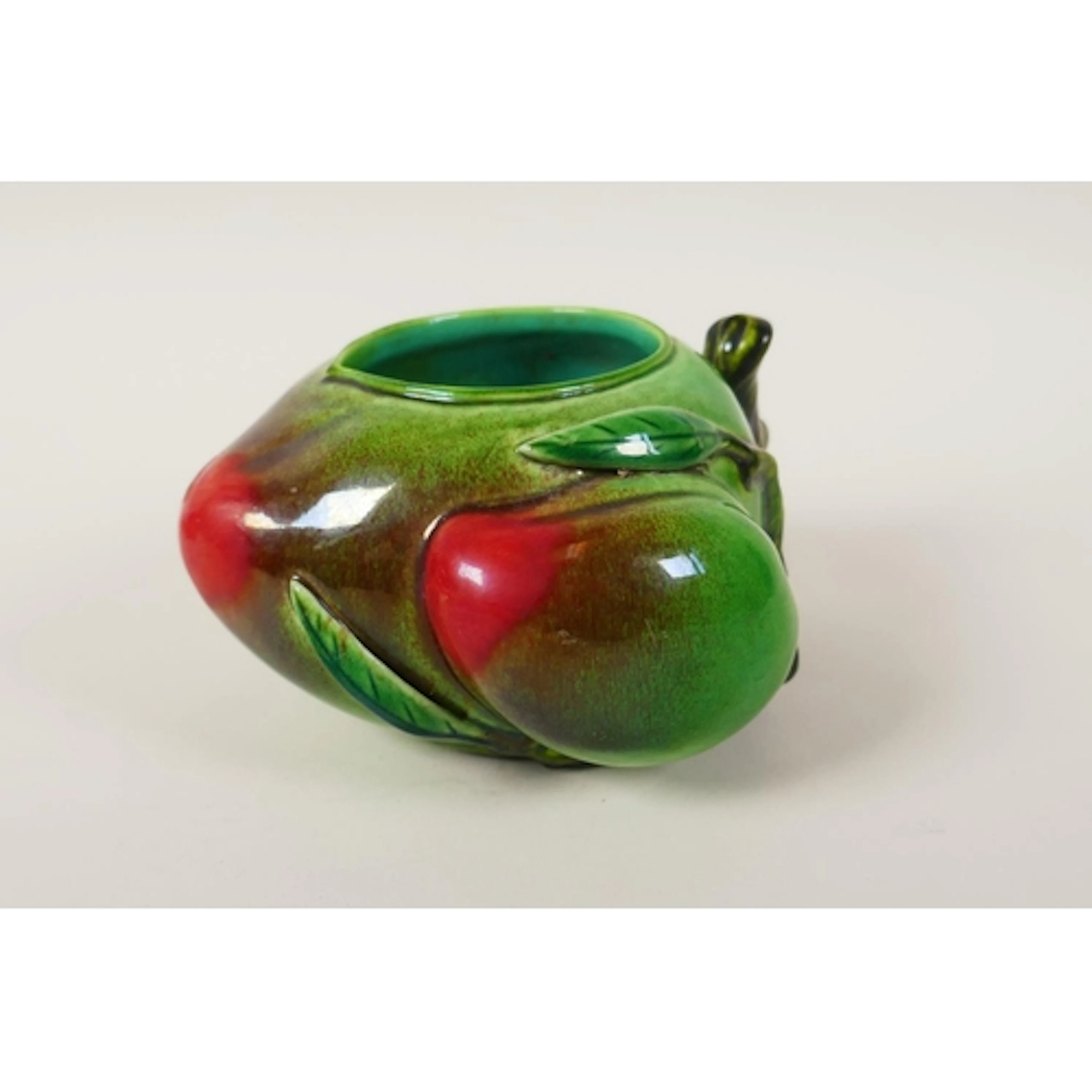 A Chinese polychrome porcelain peach shaped pot, Qianlong se...