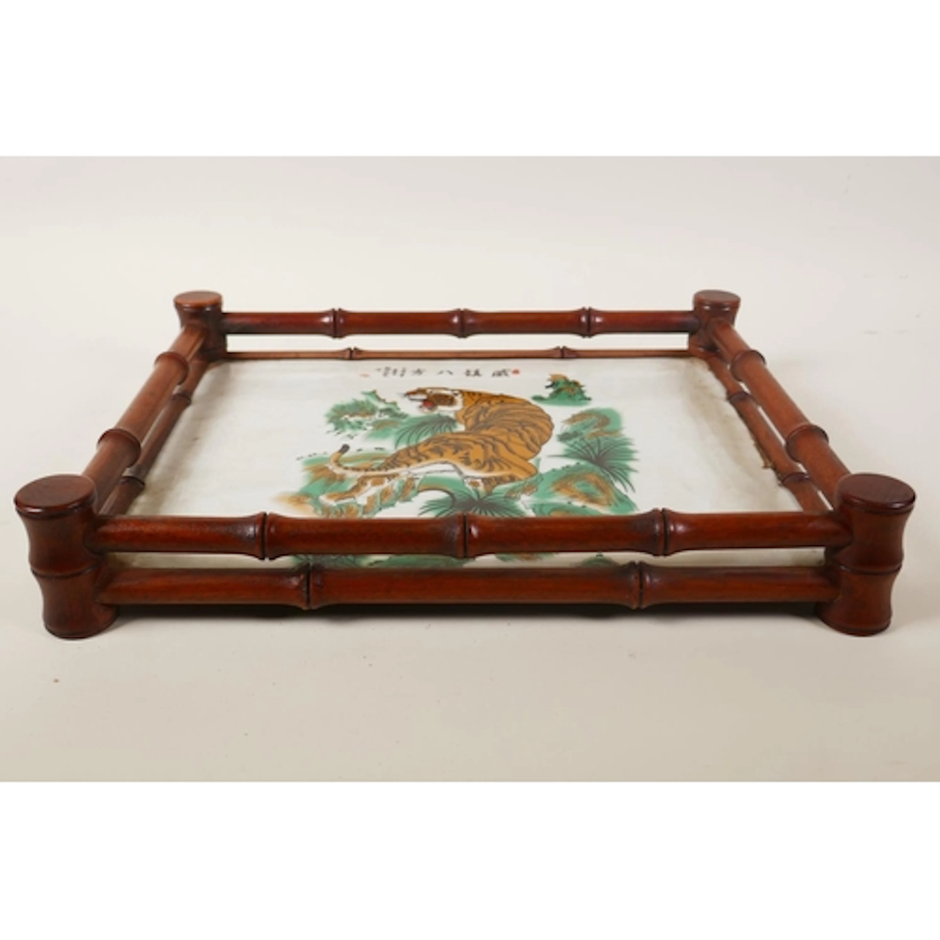 A Chinese faux bamboo tray set with a polychrome porcelain t...