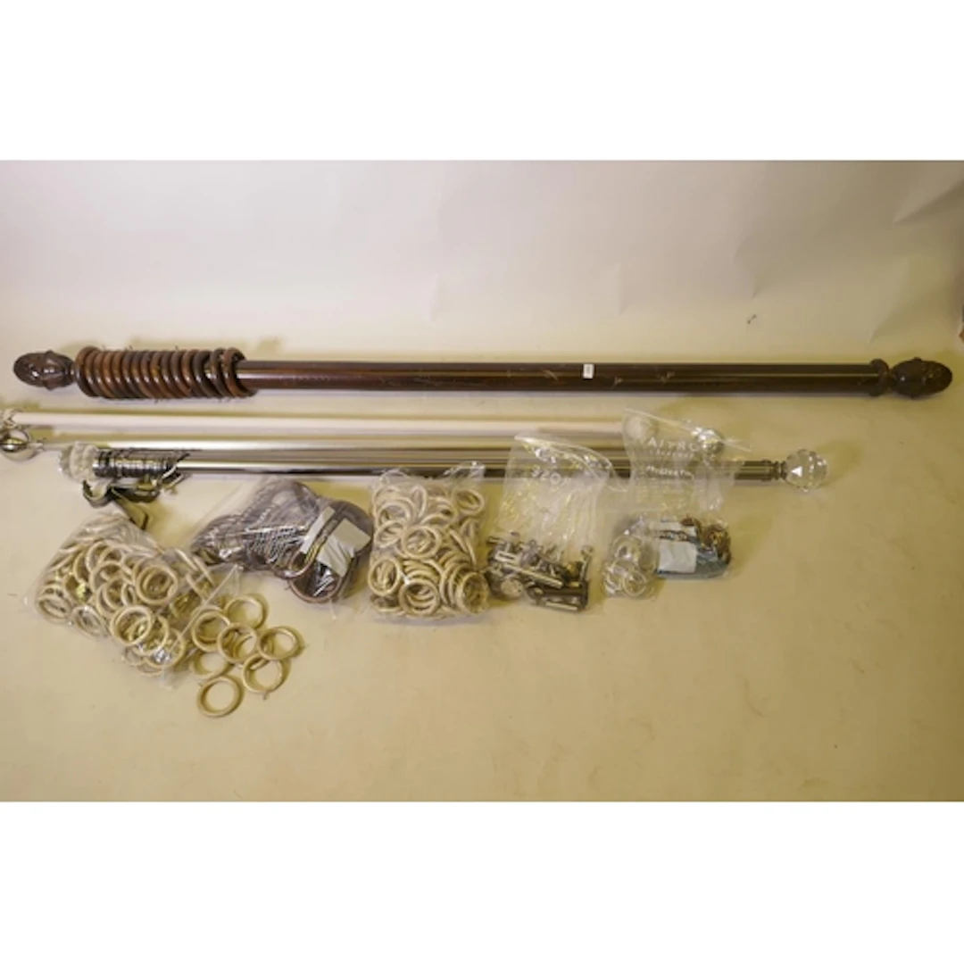 A wood curtain pole, 190cm long, 230cm with finials, brushed...