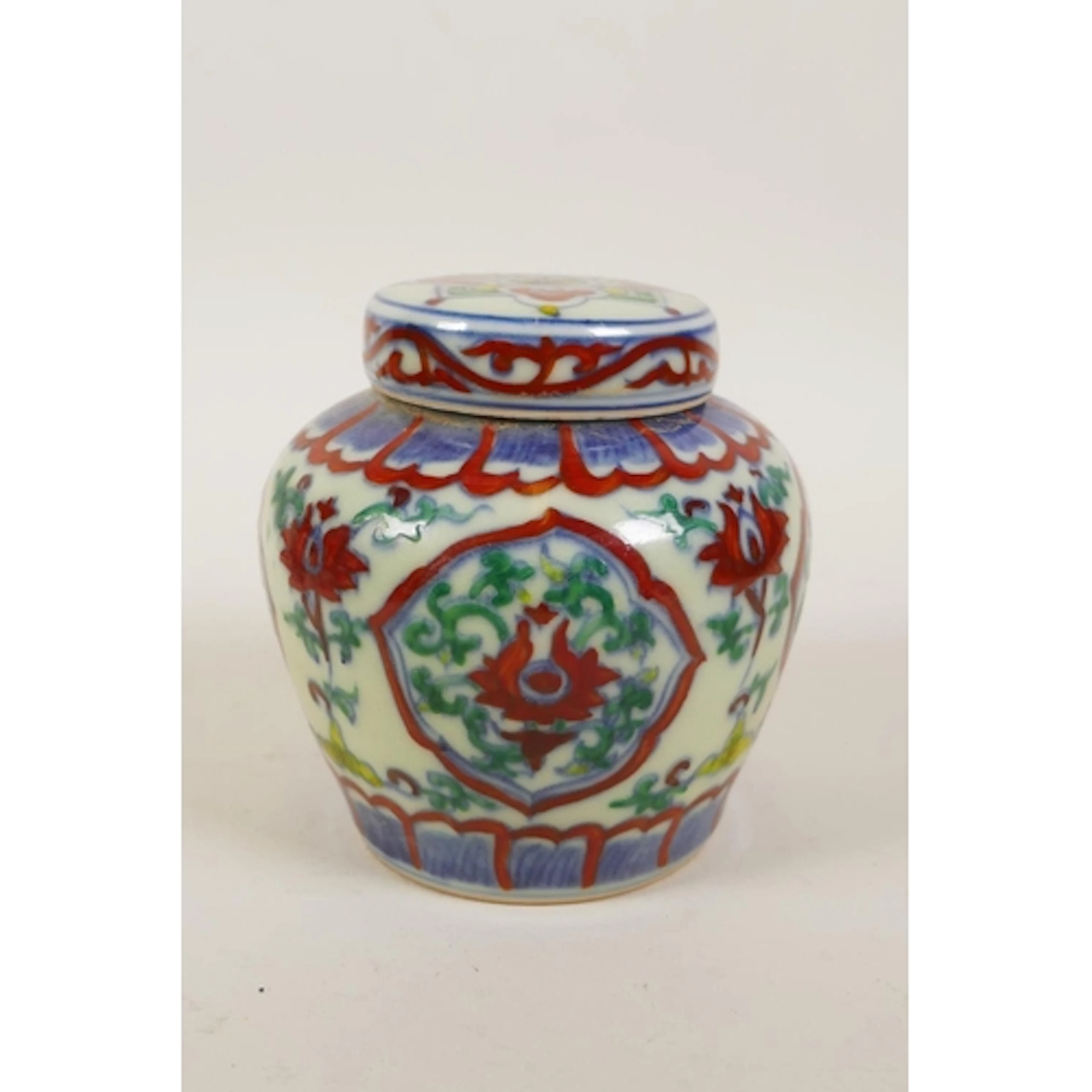 A Chinese doucai porcelain ginger jar and cover with allover...