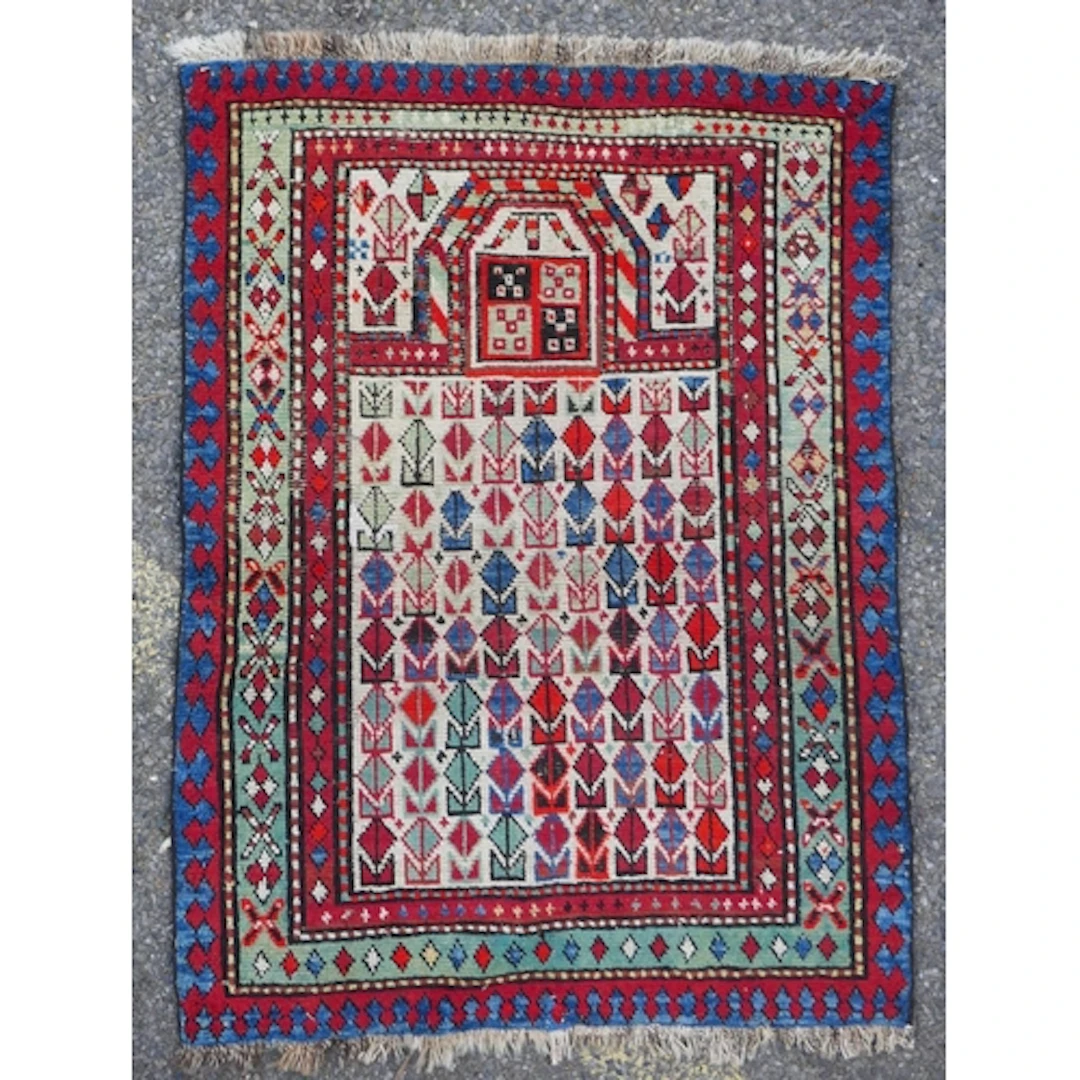 A Caucasian multi-colour wool prayer rug, 76 x 98cm