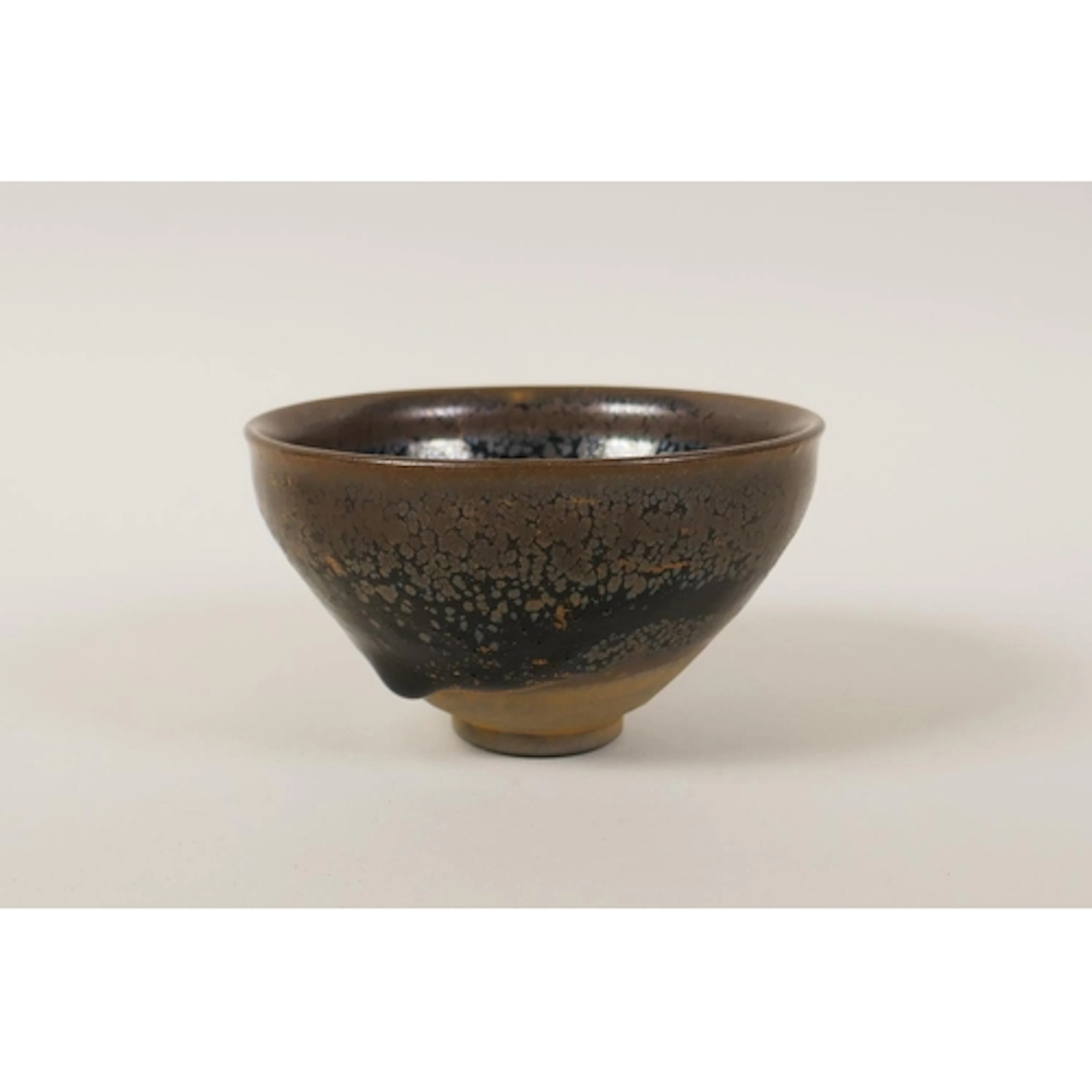 A Chinese jian kiln iridescent glazed pottery rice bowl, 10c...