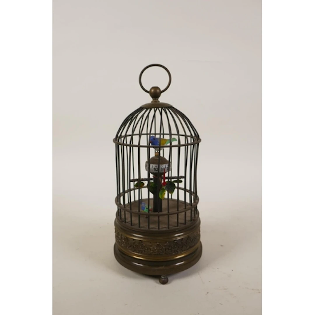 A vintage style brass birdcage automaton clock, 19cm high
