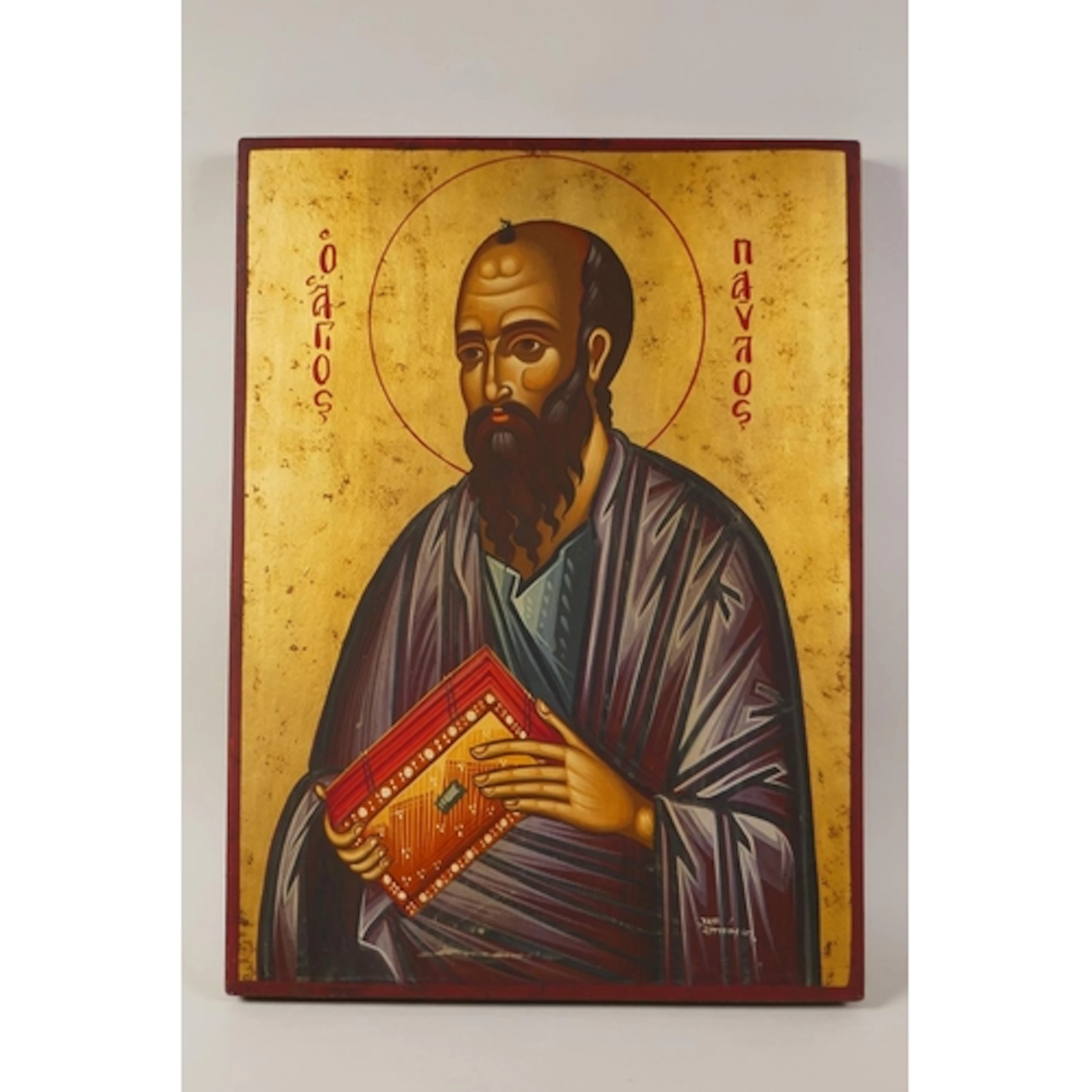A painted and gilt Greek Orthodox icon of St Paul, signed, 3...