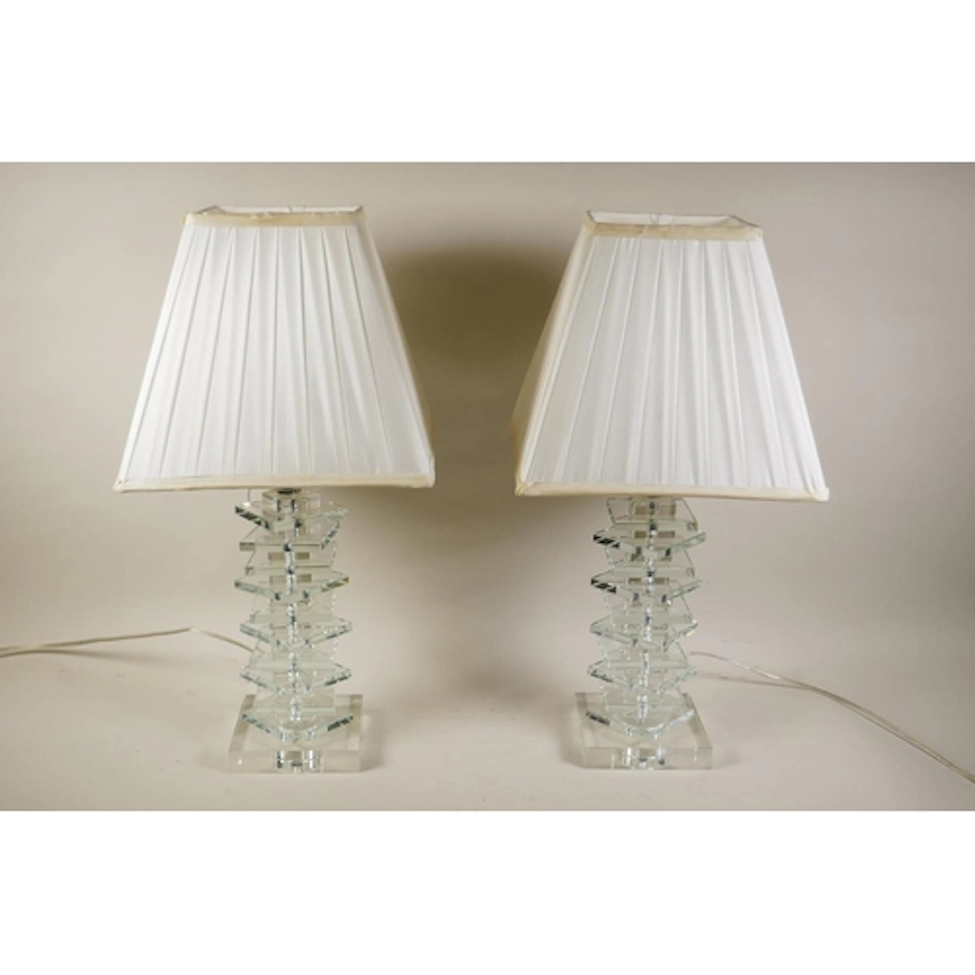 A pair of contemporary stacked glass table lamps, 55cm high