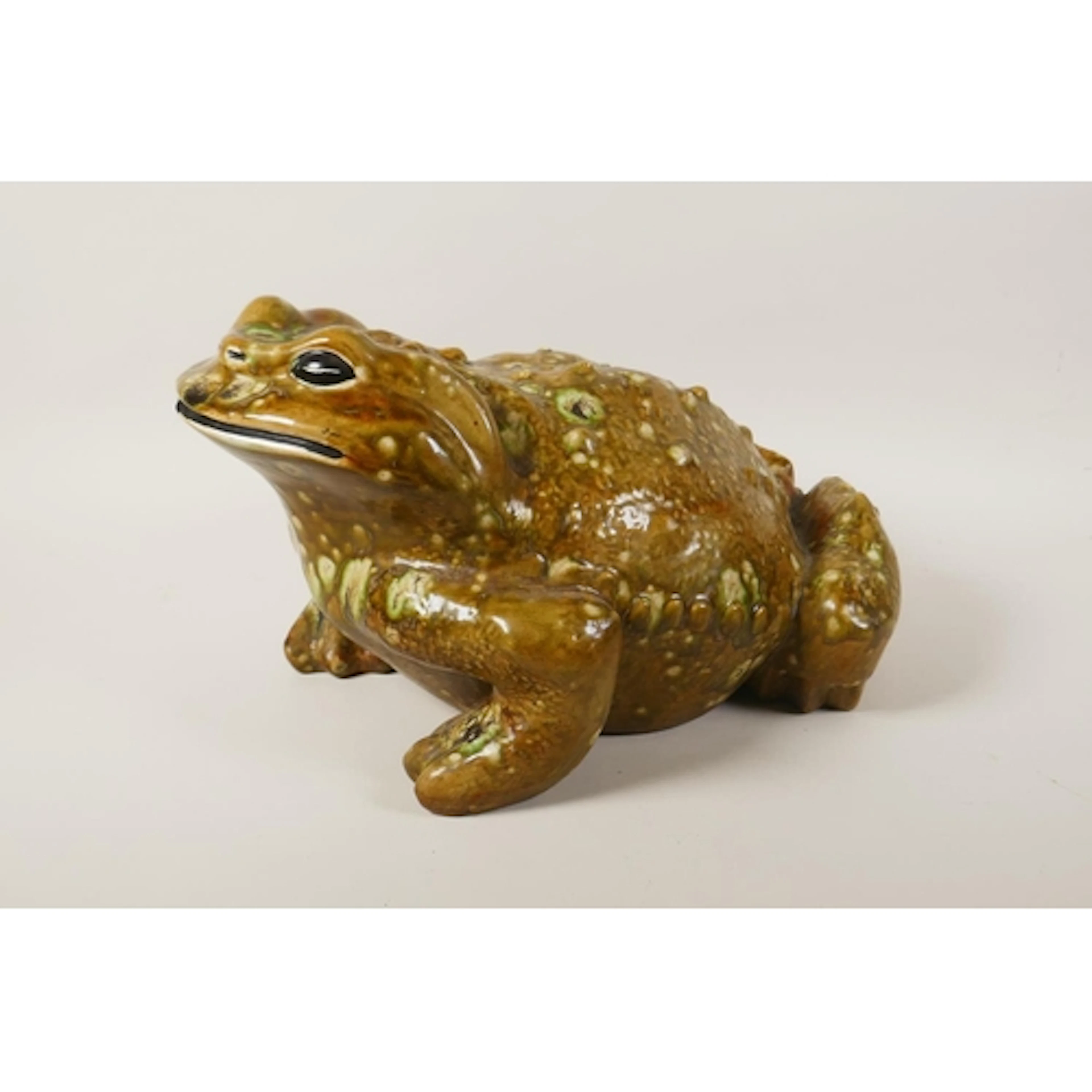 A large Sancai glazed ceramic toad, 34cm long