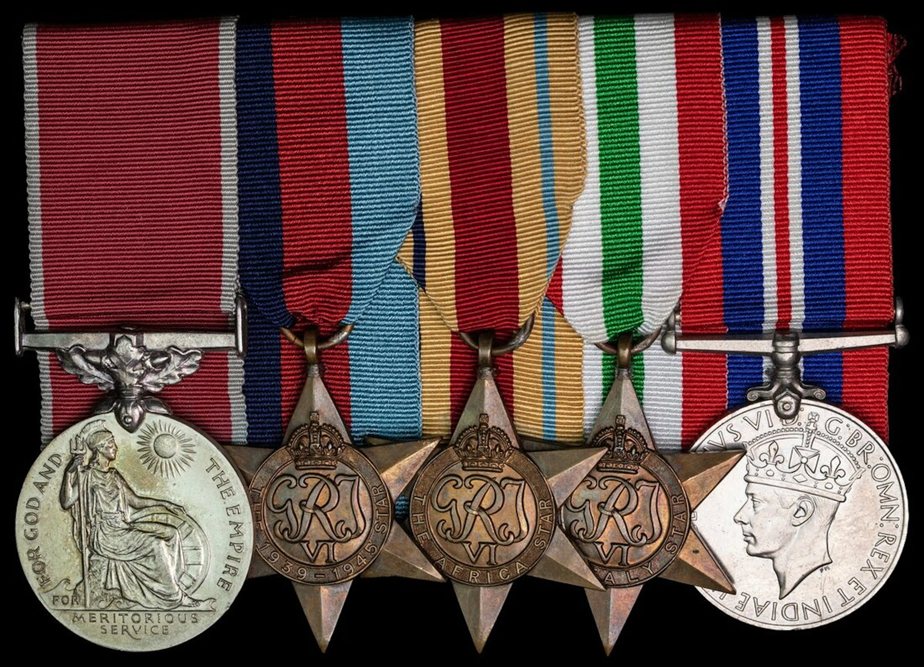 A B.E.M. group of five awarded to Mr A. N. Irvine, Custodian of Chedworth