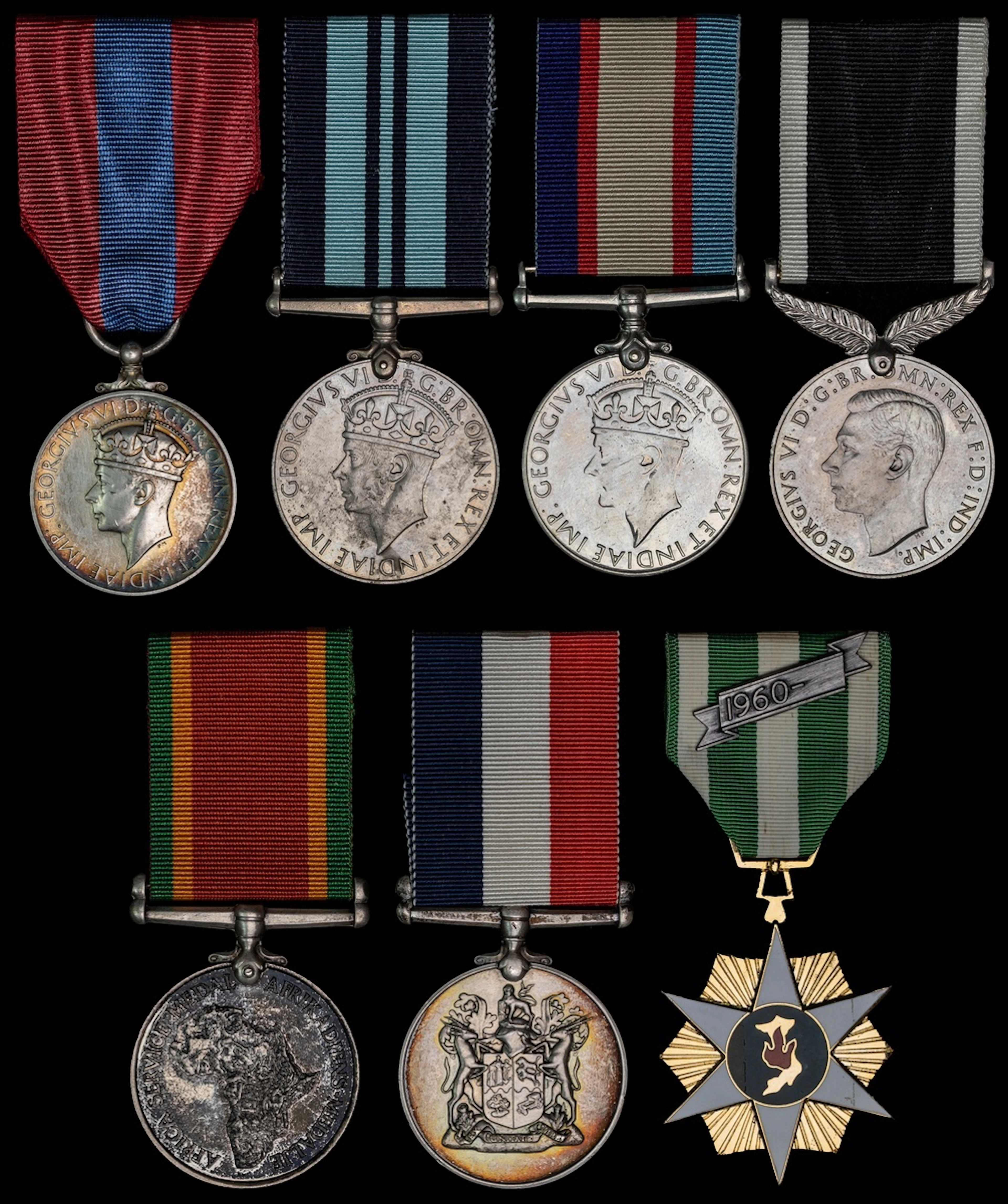 The Australia Service Medal awarded to Private H. J. Jennes, 2/1st