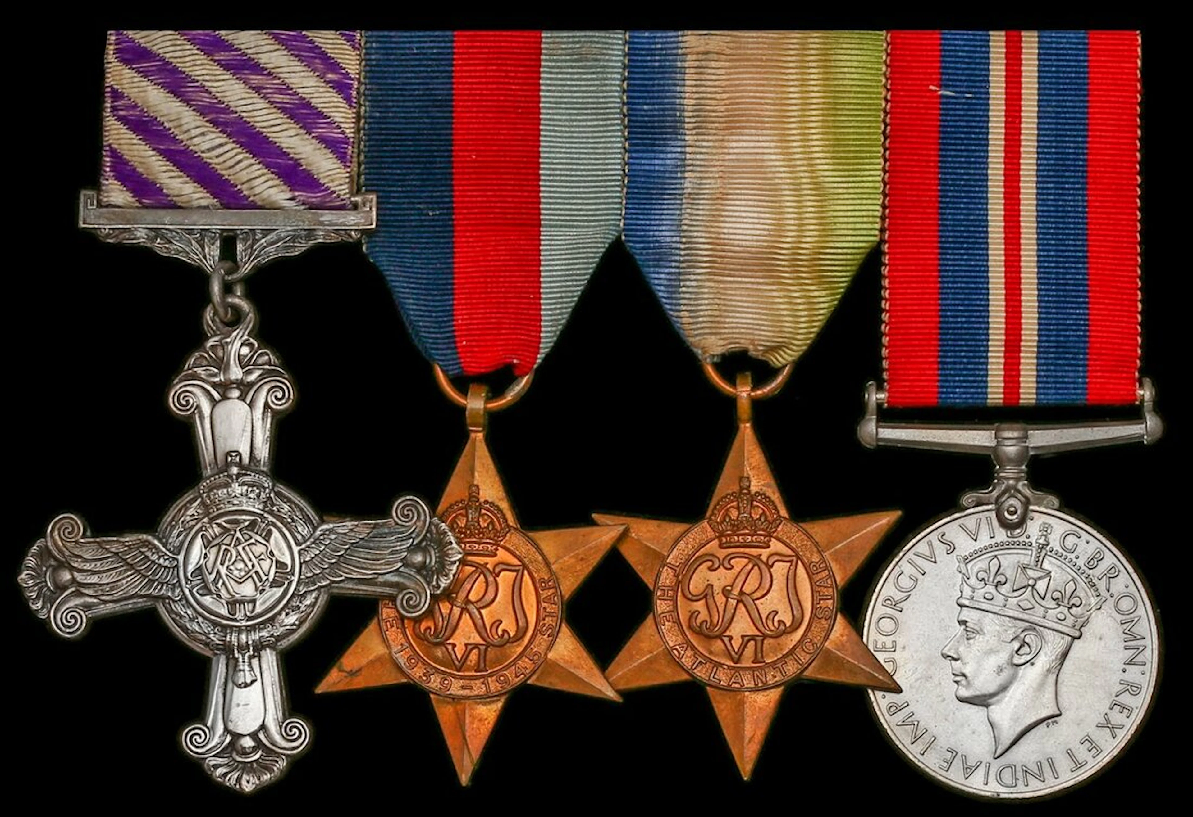 A Second World War D.F.C. group of four attributed to Flight Lieutenant