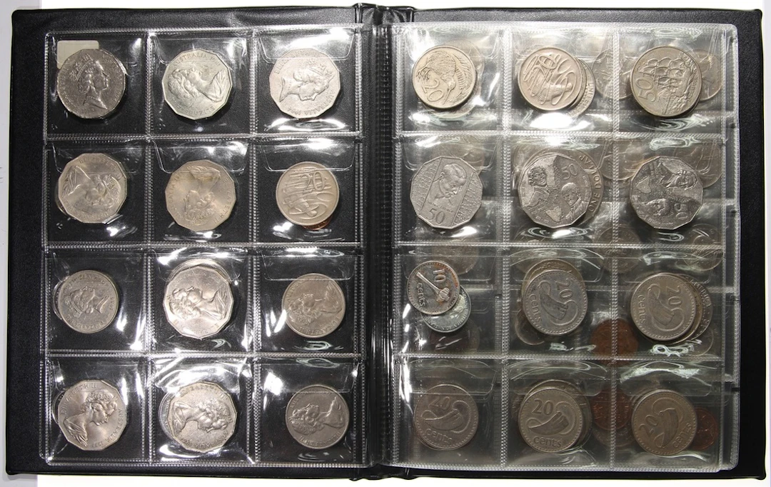 World Coins, an album of 130+, including US, Canada, Australia and New Zealand