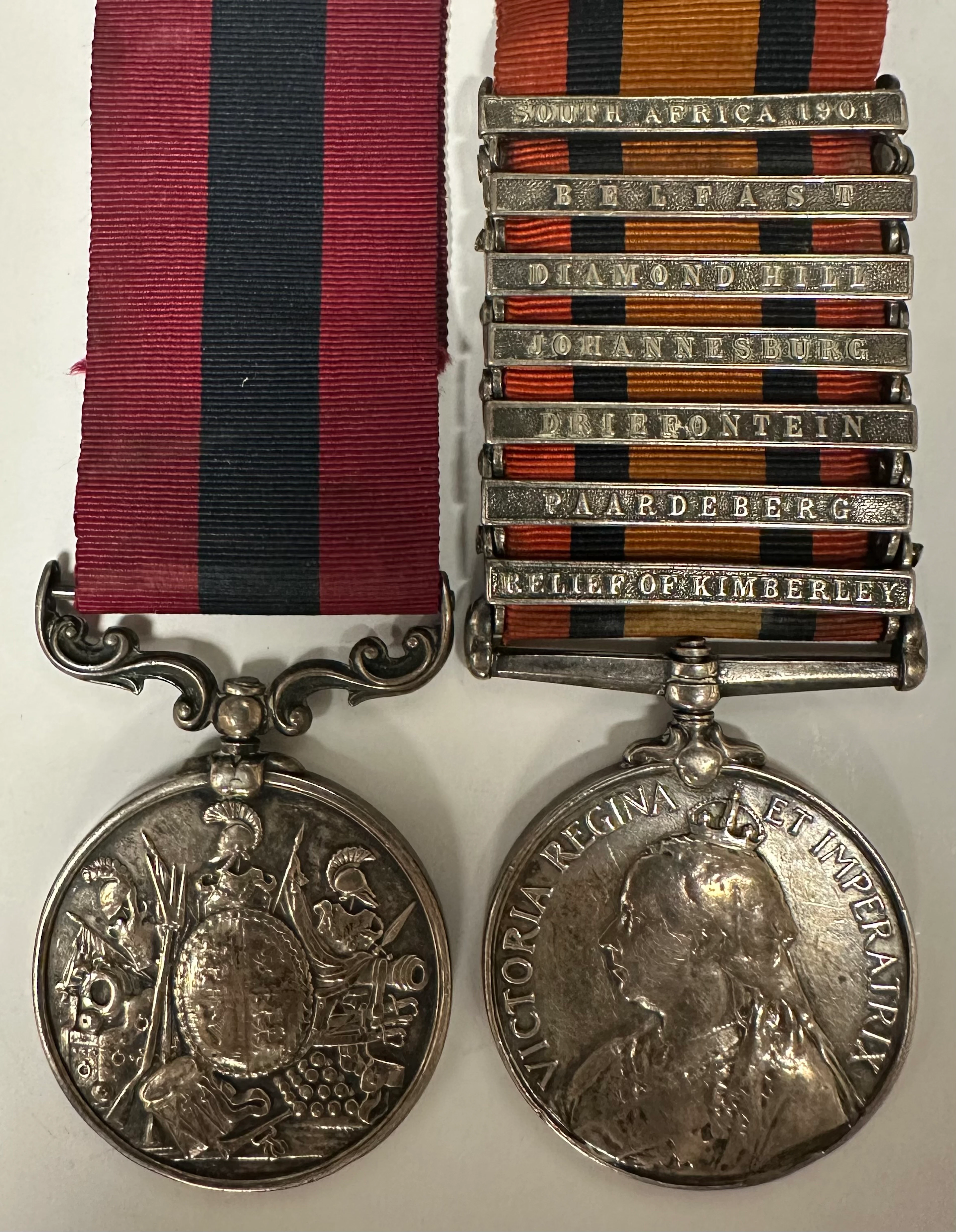 A scarce Boer War D.C.M. pair awarded to Private W. Pearson, 1st Battalion