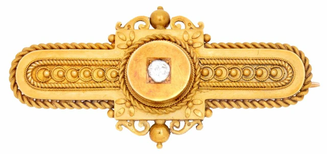 A VICTORIAN ARCHAEOLOGICAL REVIVAL DIAMOND BROOCH