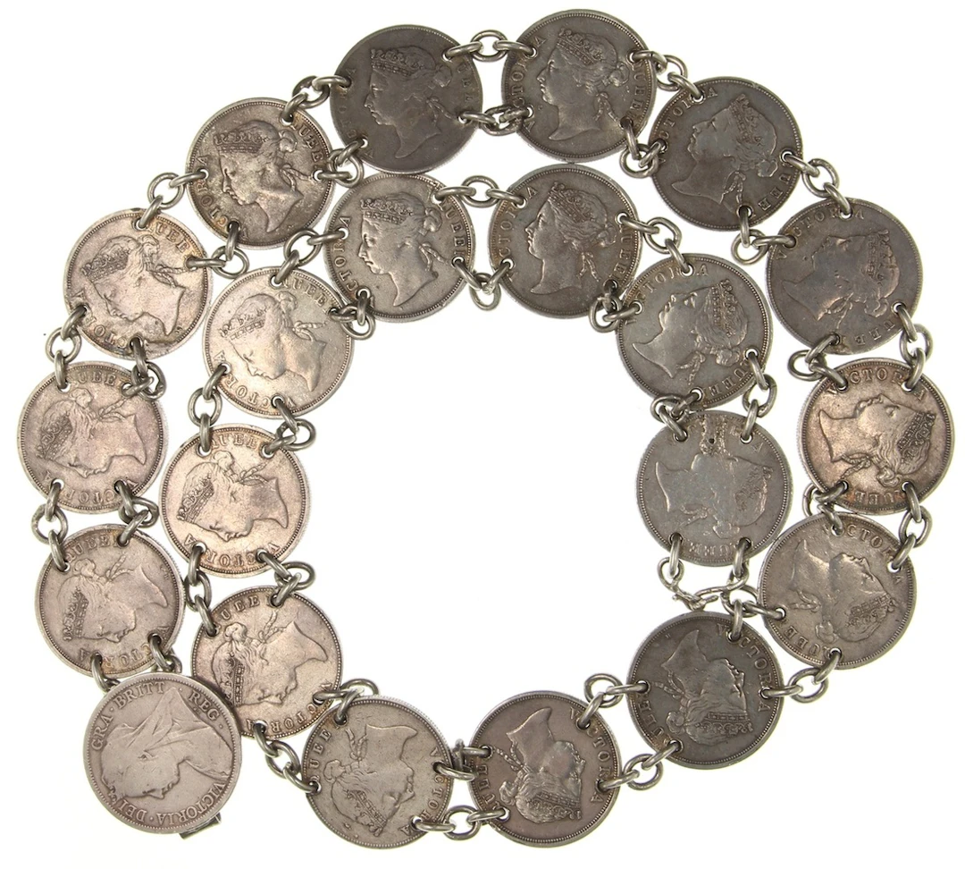 Hong Kong and Straits Settlements, an Iban silver belt made up of: